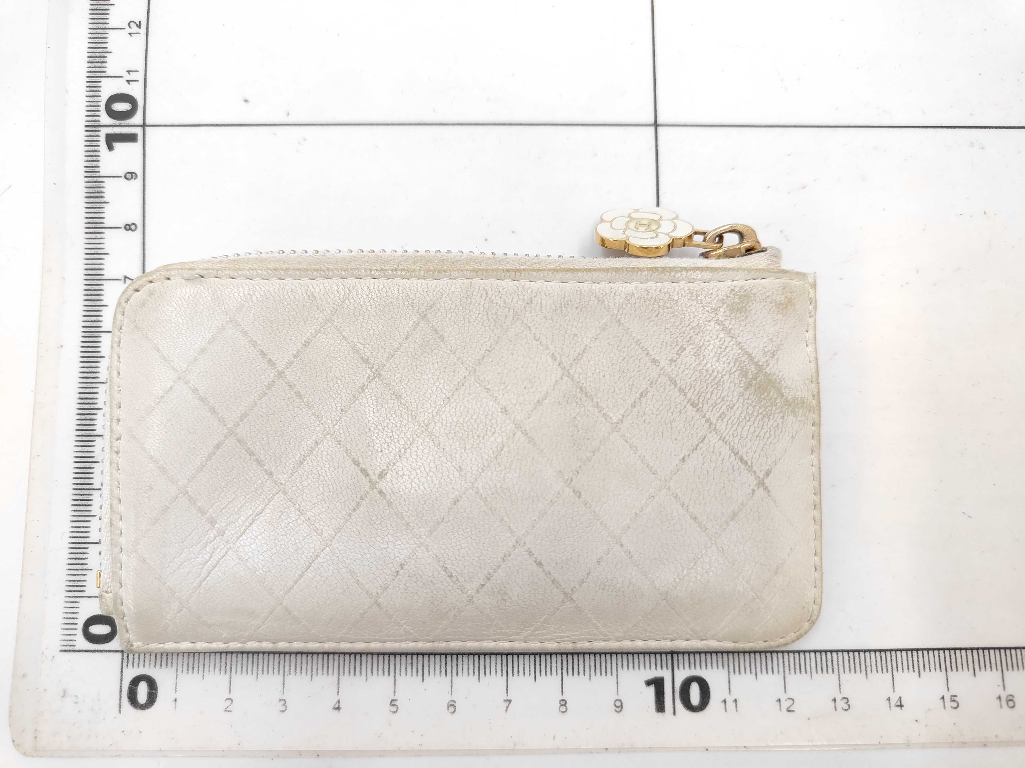 coin case with camellia charm, ivory, serial number 9. — view 2