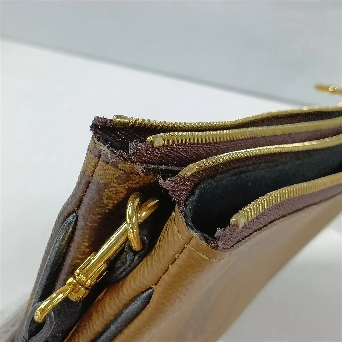Giant Monogram Reverse Pochette Double Zip M69203 MI3290 Brown — view 10