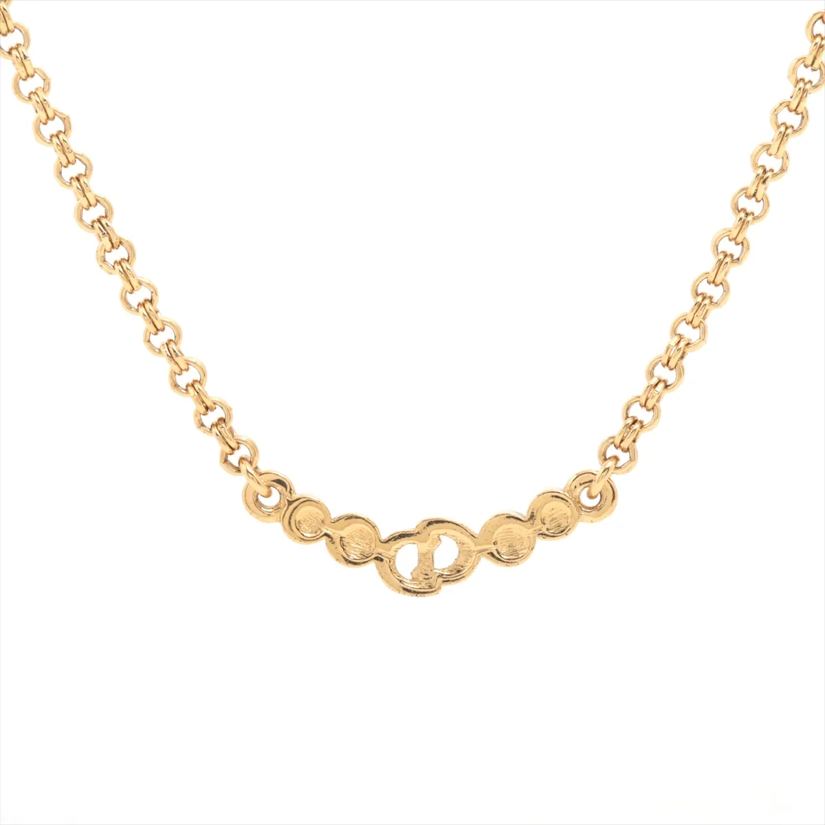 CD logo necklace, gold plated with rhinestones. Shows signs of wear, including — view 2