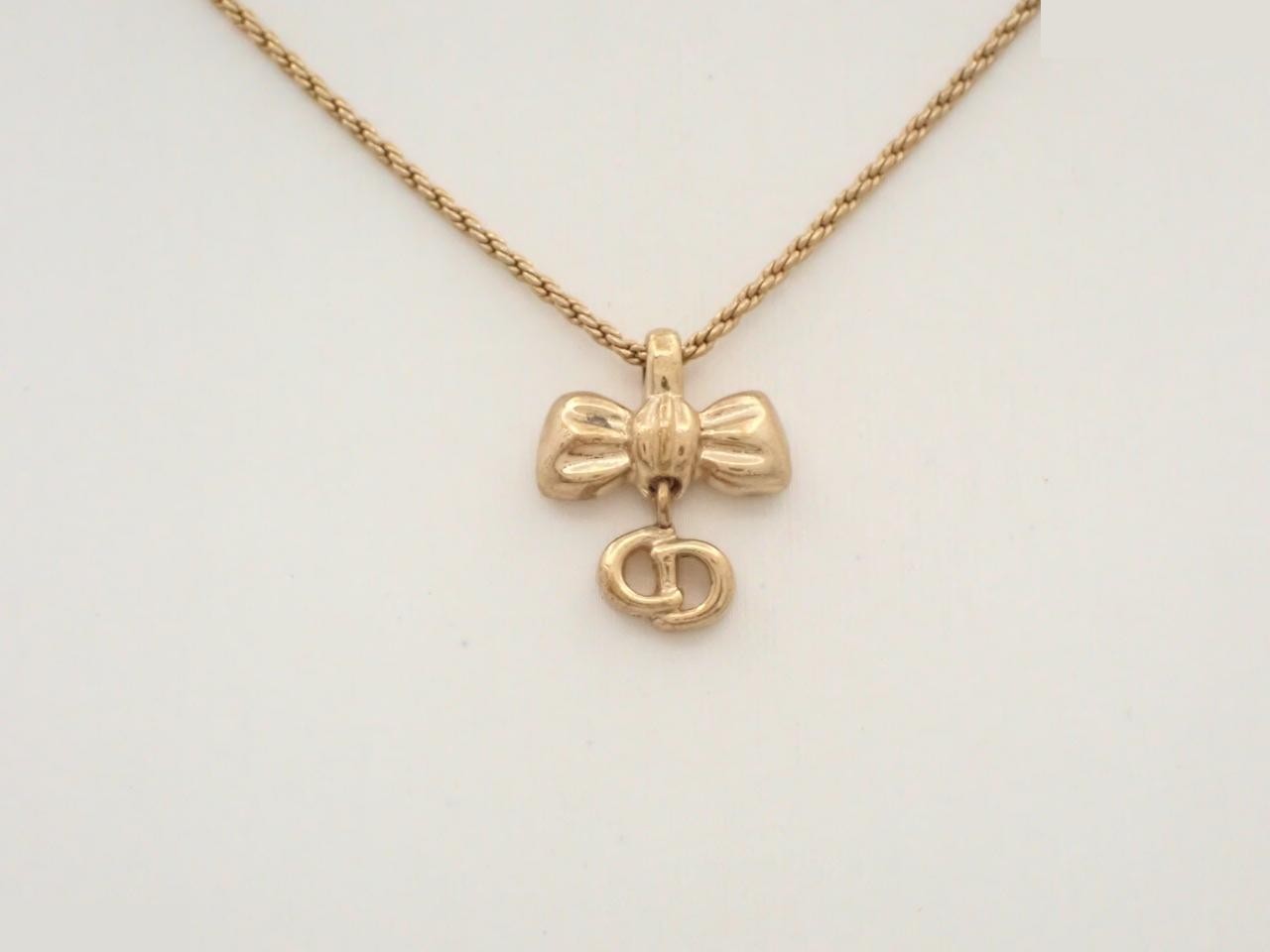 Ribbon, CD logo, precious metal necklace/pendant, neck circumference approximately 47cm