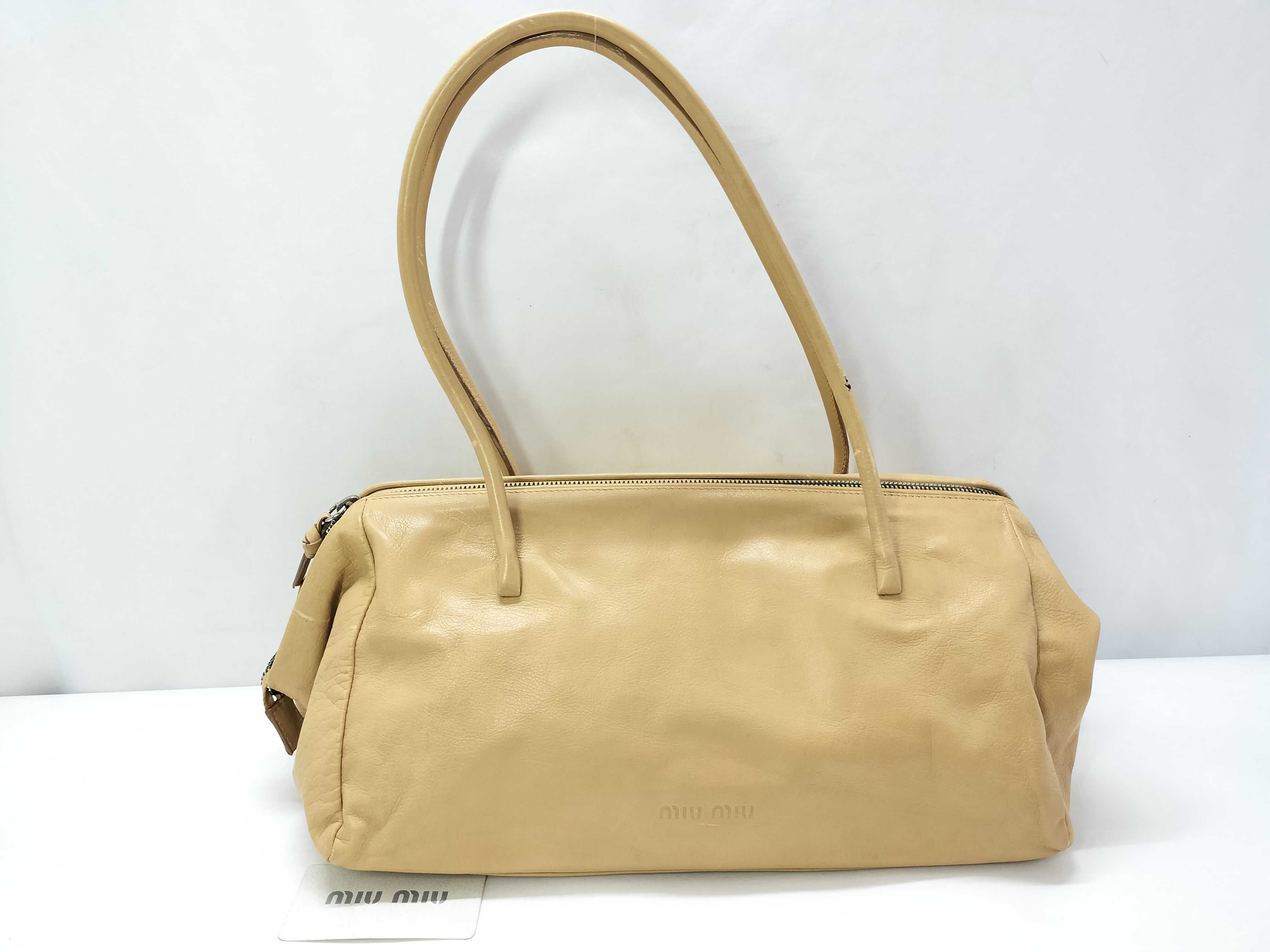 beige handbag