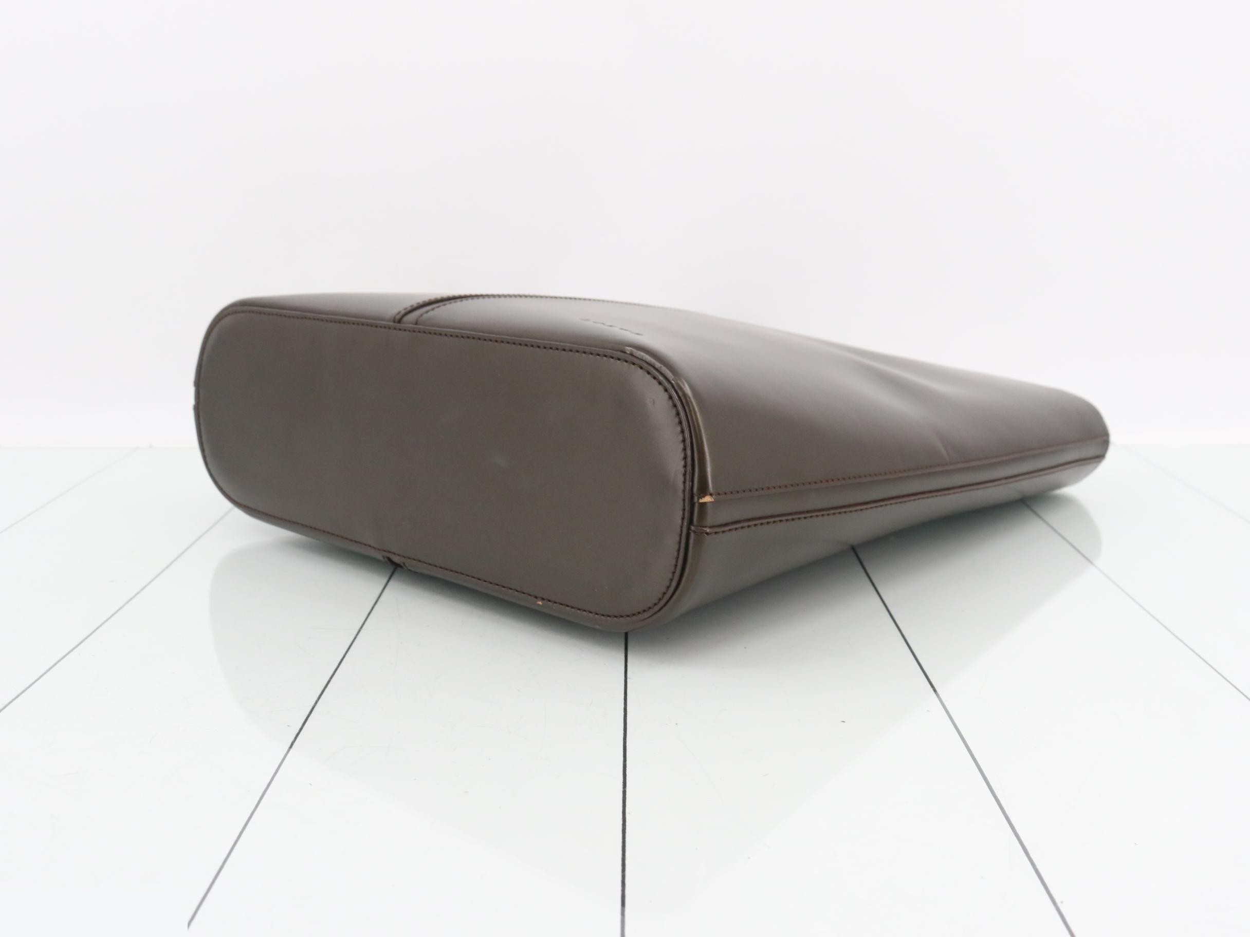 Logo, vertical, leather, brown handbag — view 6