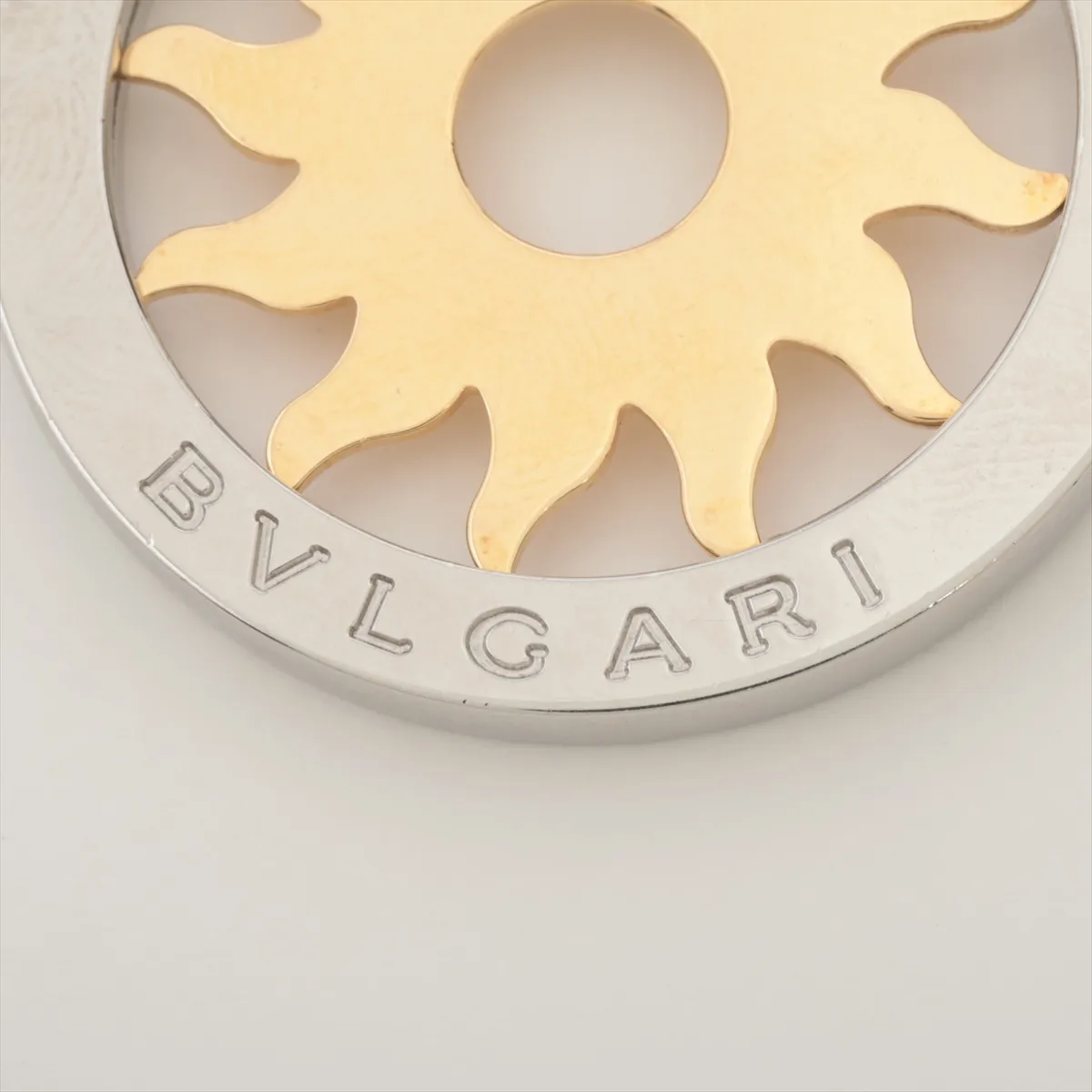 Tondo Sun necklace pendant, 750 (yellow gold) x stainless steel, 11.0g. Some dents, slight looseness in the bail. — view 3
