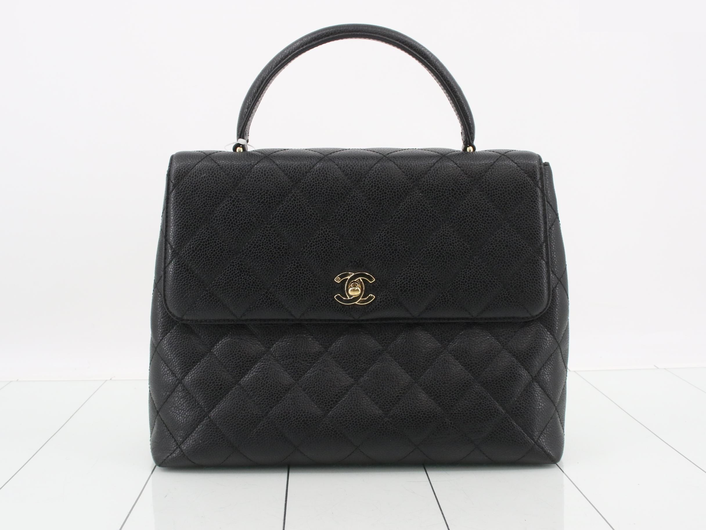 Caviar skin handbag