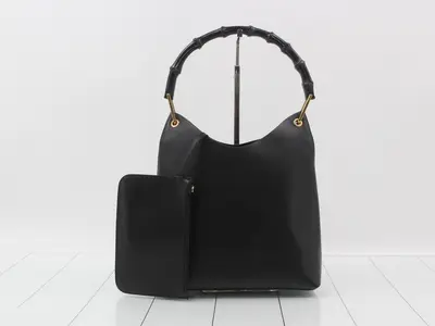 One-shoulder leather bamboo handbag