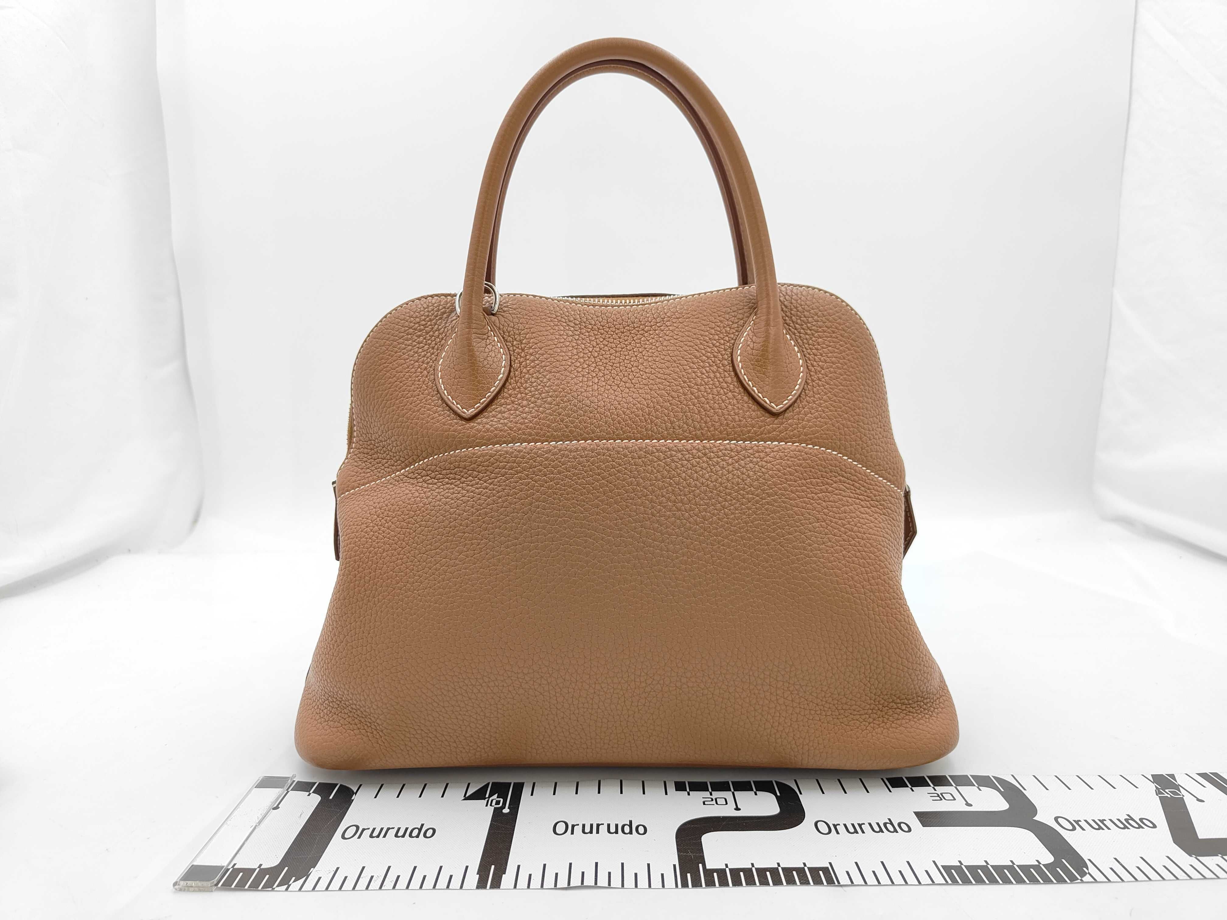 Bolide 31 handbag (T stamp), Taurillon Clemence leather, gold finish. — view 2
