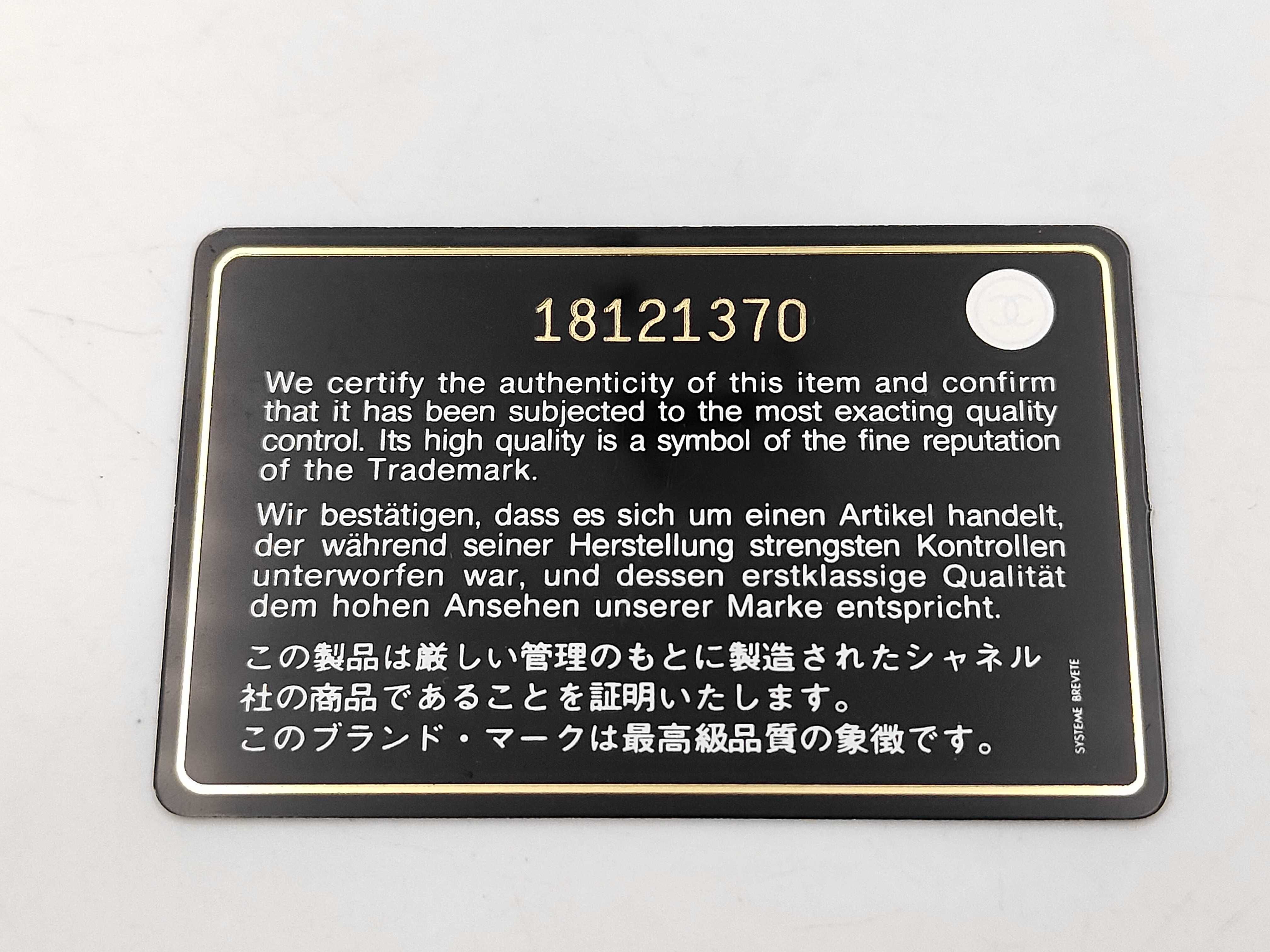 Camellia Long Wallet, Black, with card and sticker, serial number in the 18 range. — view 9