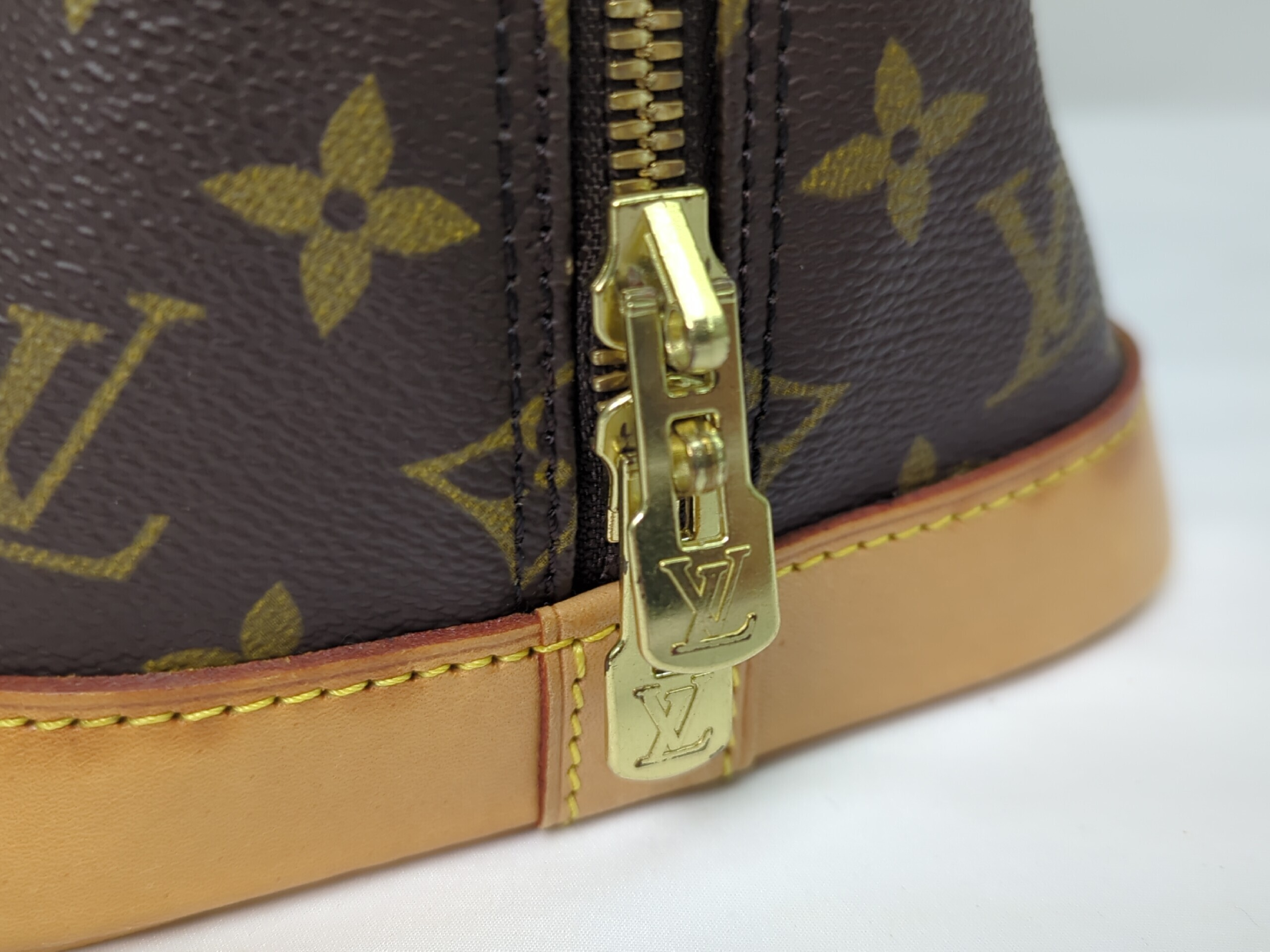 M51130 Monogram Alma Handbag — view 9