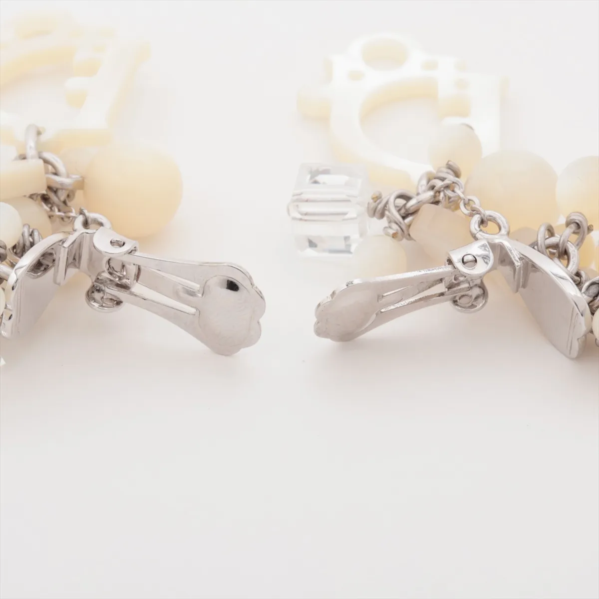 logo earrings (for both ears), metal and faux pearl, silver. Shows signs of wear, — view 4