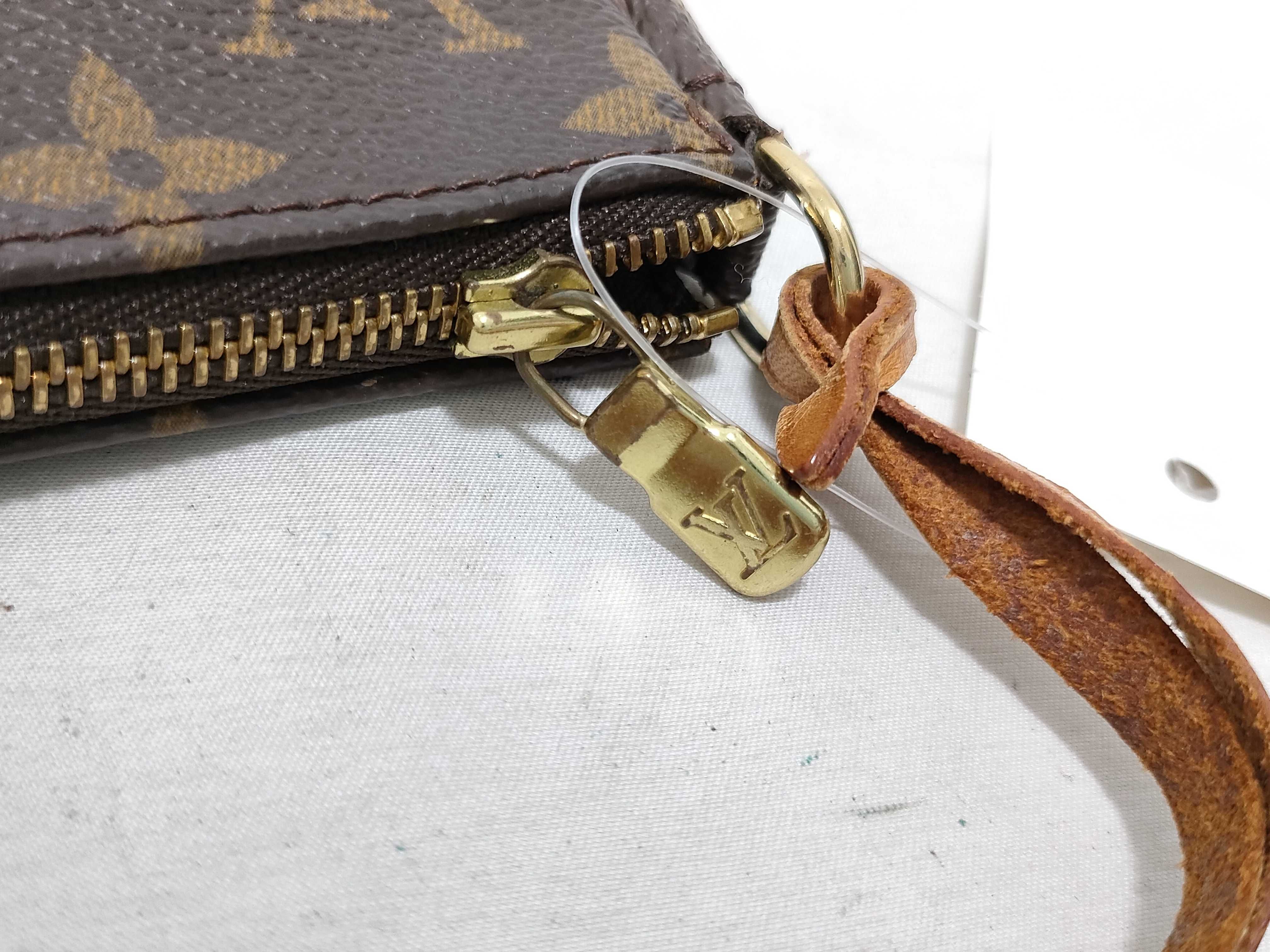 Monogram Accessoires (handle peeling) pouch — view 12