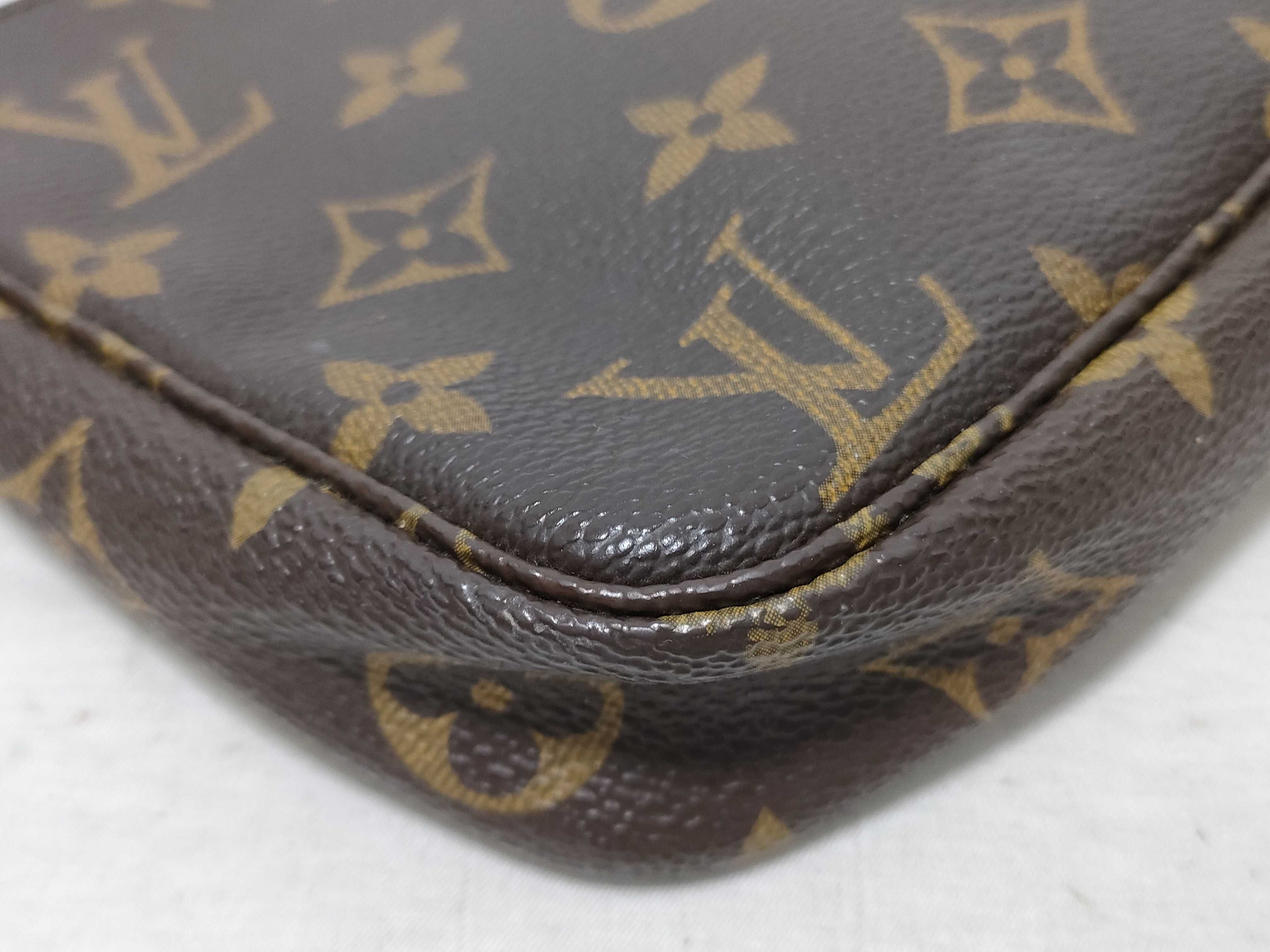 Monogram Accessoires (handle peeling) pouch — view 7