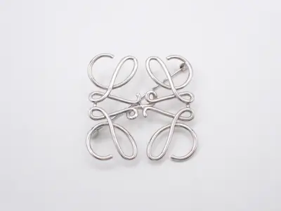 Anagram brooch, silver hardware