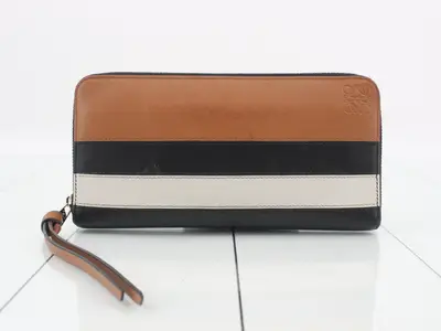 Zip-around zipper wallet, with box.