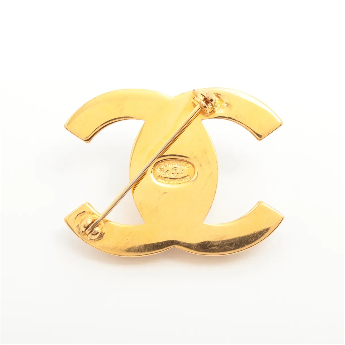 Coco Mark Turnlock Brooch 96A, GP x Rhinestone, Gold. Shows signs of wear, — view 2