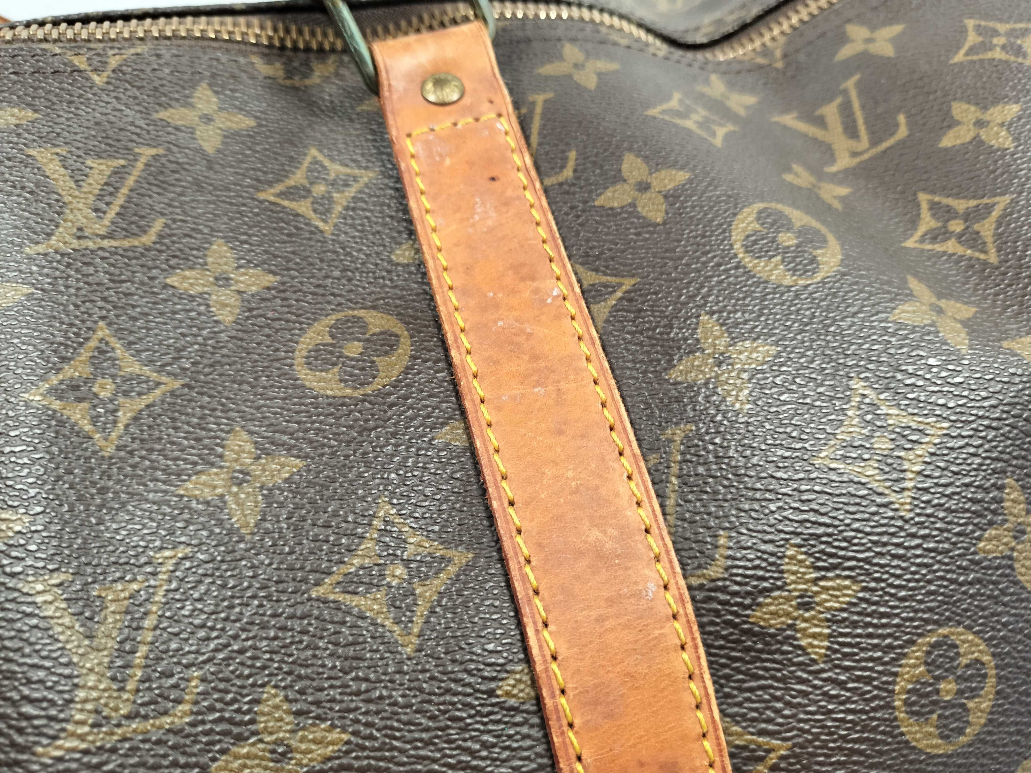 Monogram LOUIS_VUITTON M41424 Keepall 55 MI9001 Boston bag with name tag, handle strap, and padlock. — view 11