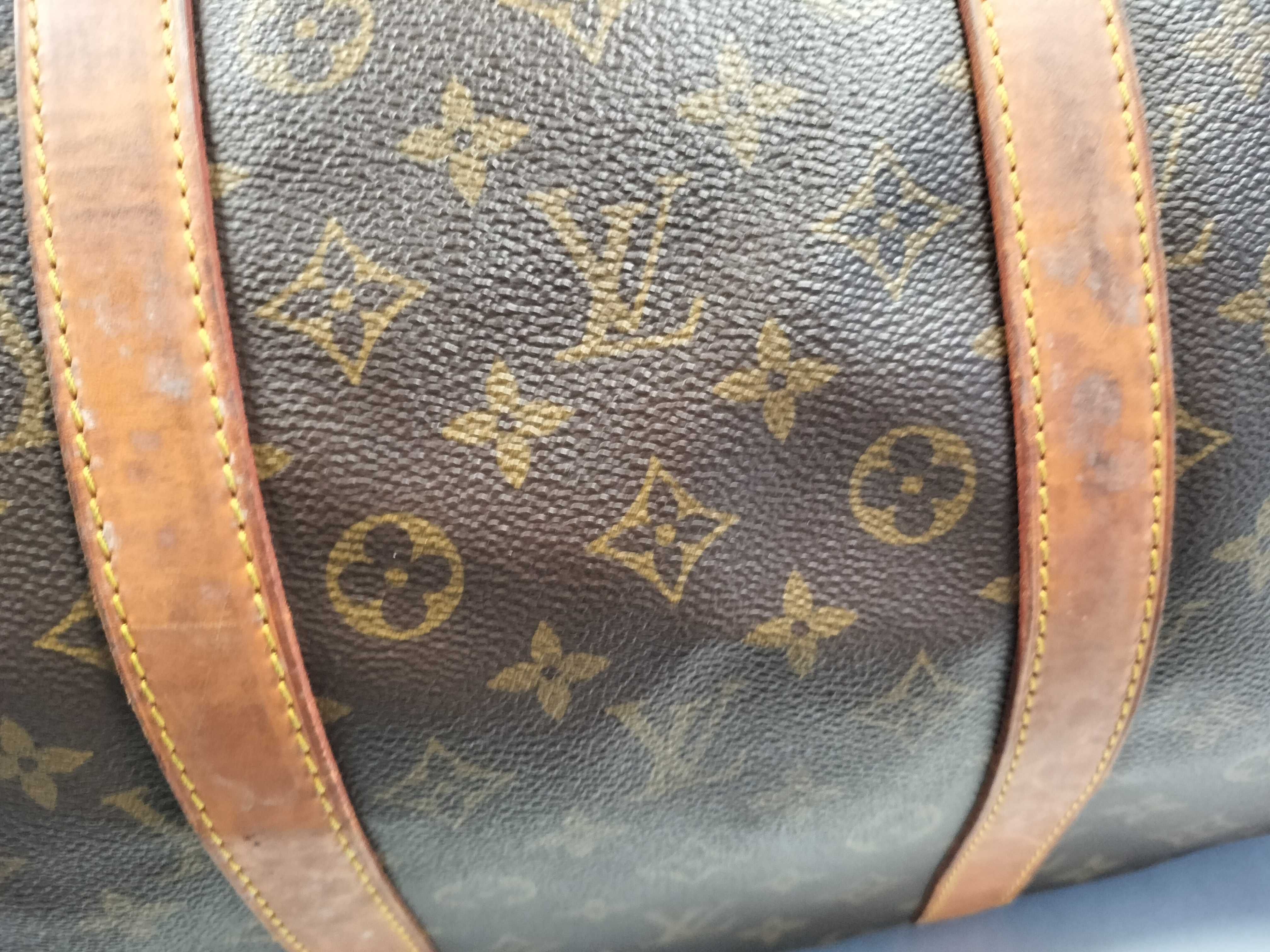 Monogram LOUIS_VUITTON M41424 Keepall 55 MI9001 Boston bag with name tag, handle strap, and padlock. — view 12