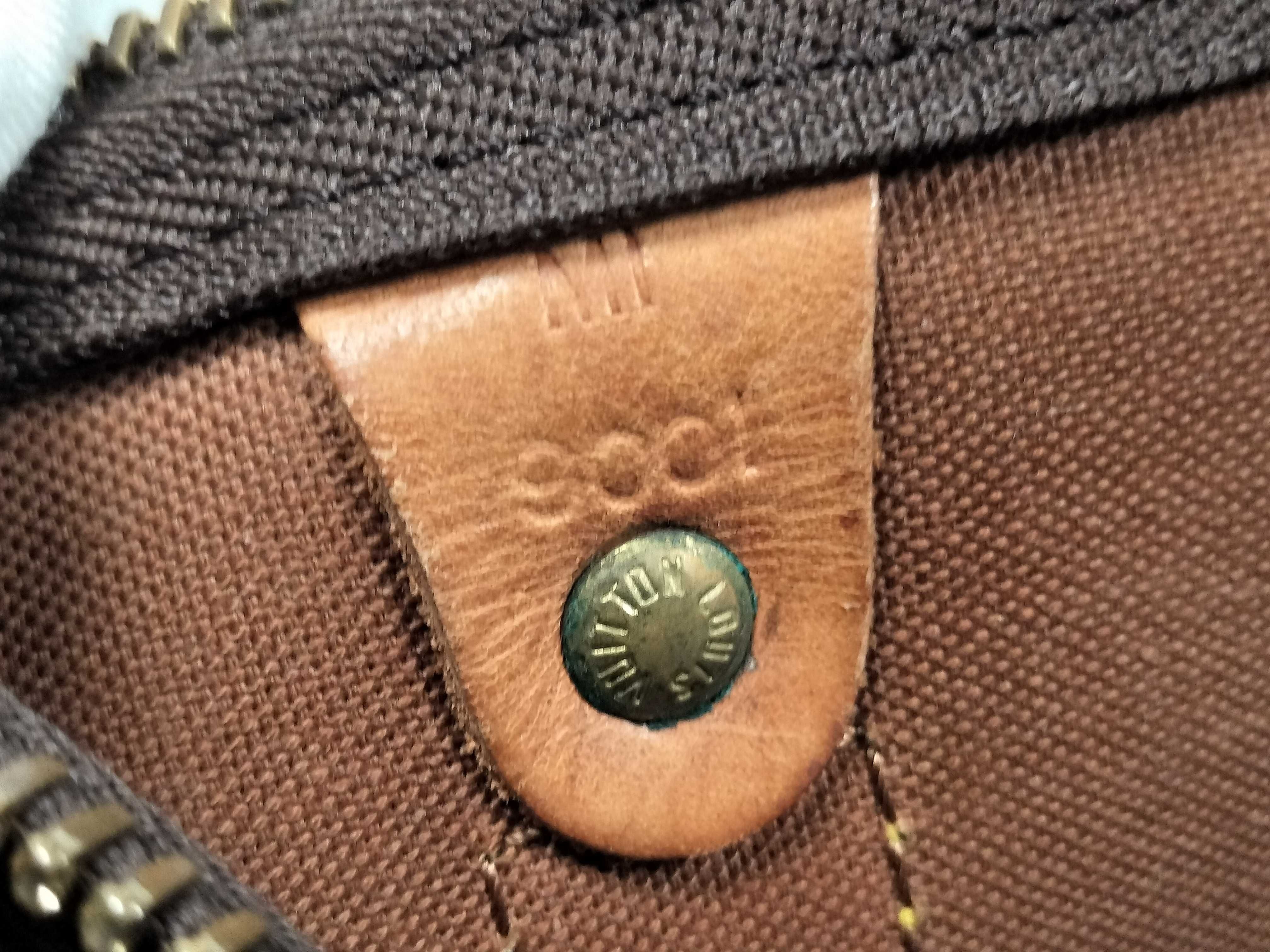 Monogram LOUIS_VUITTON M41424 Keepall 55 MI9001 Boston bag with name tag, handle strap, and padlock. — view 15