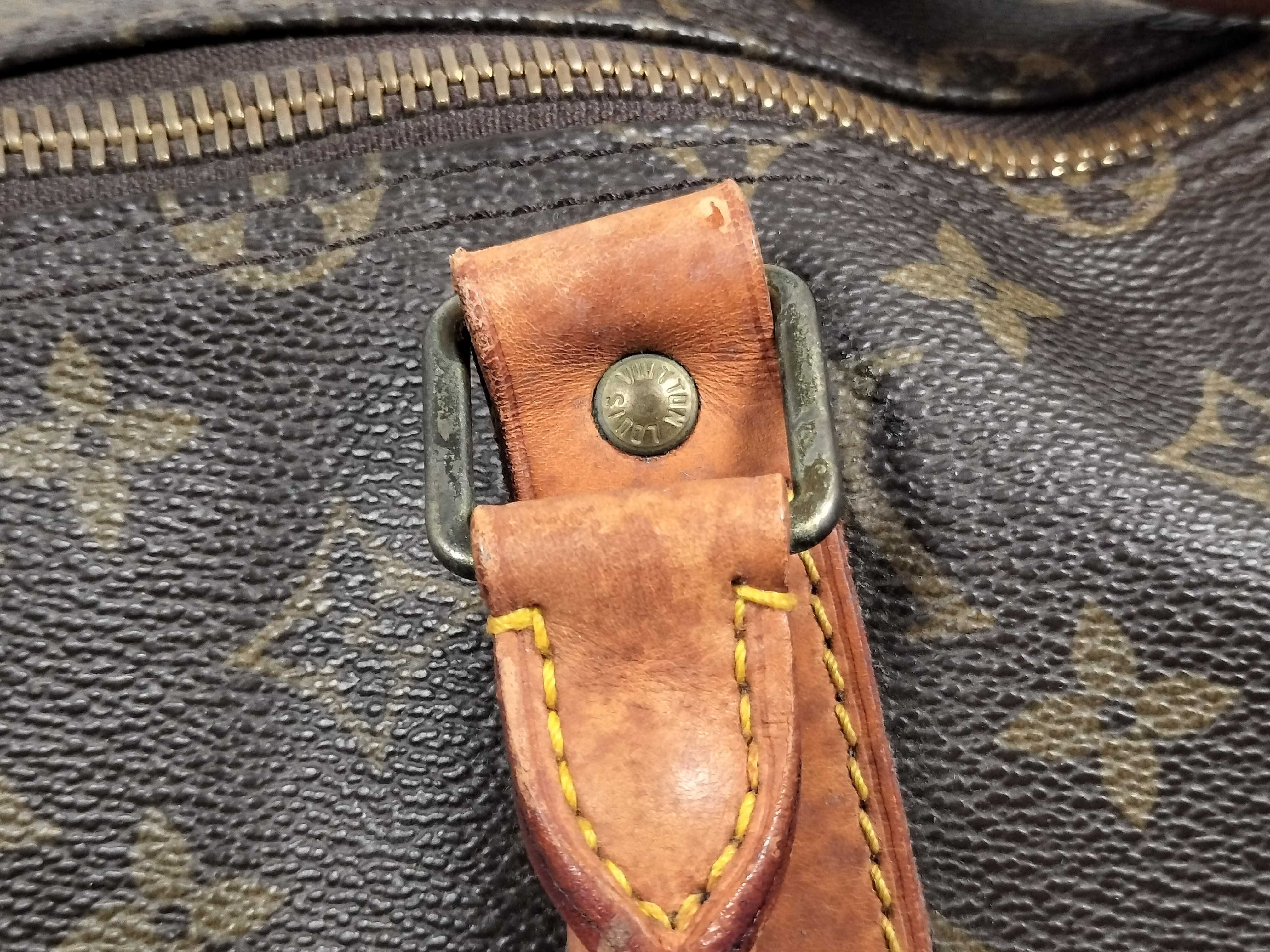 Monogram LOUIS_VUITTON M41424 Keepall 55 MI9001 Boston bag with name tag, handle strap, and padlock. — view 5
