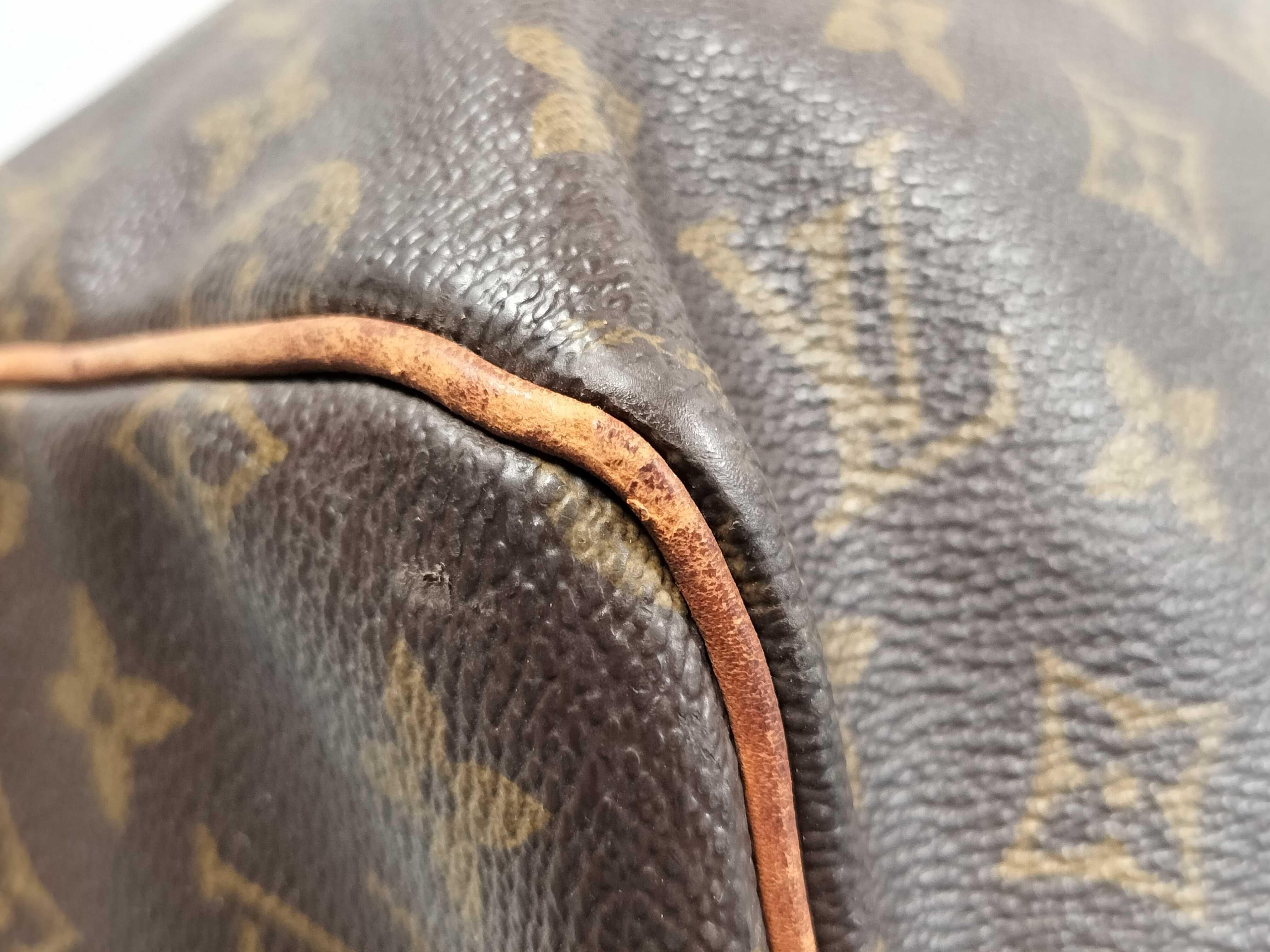 Monogram LOUIS_VUITTON M41424 Keepall 55 MI9001 Boston bag with name tag, handle strap, and padlock. — view 6