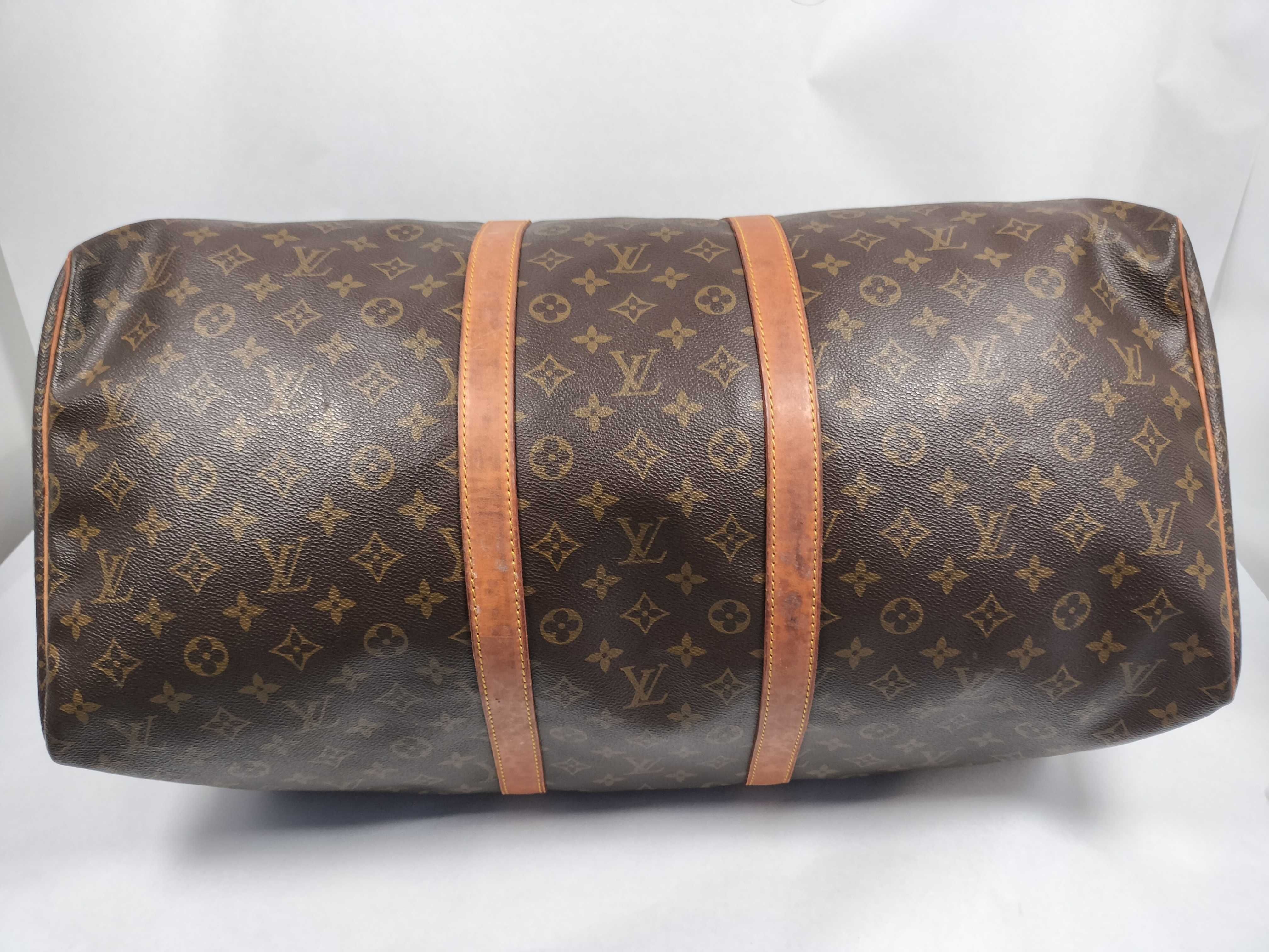 Monogram LOUIS_VUITTON M41424 Keepall 55 MI9001 Boston bag with name tag, handle strap, and padlock. — view 7