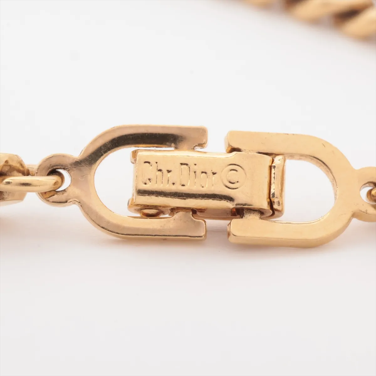 CD logo bracelet, gold plated with rhinestones. Shows signs of wear, including — view 5