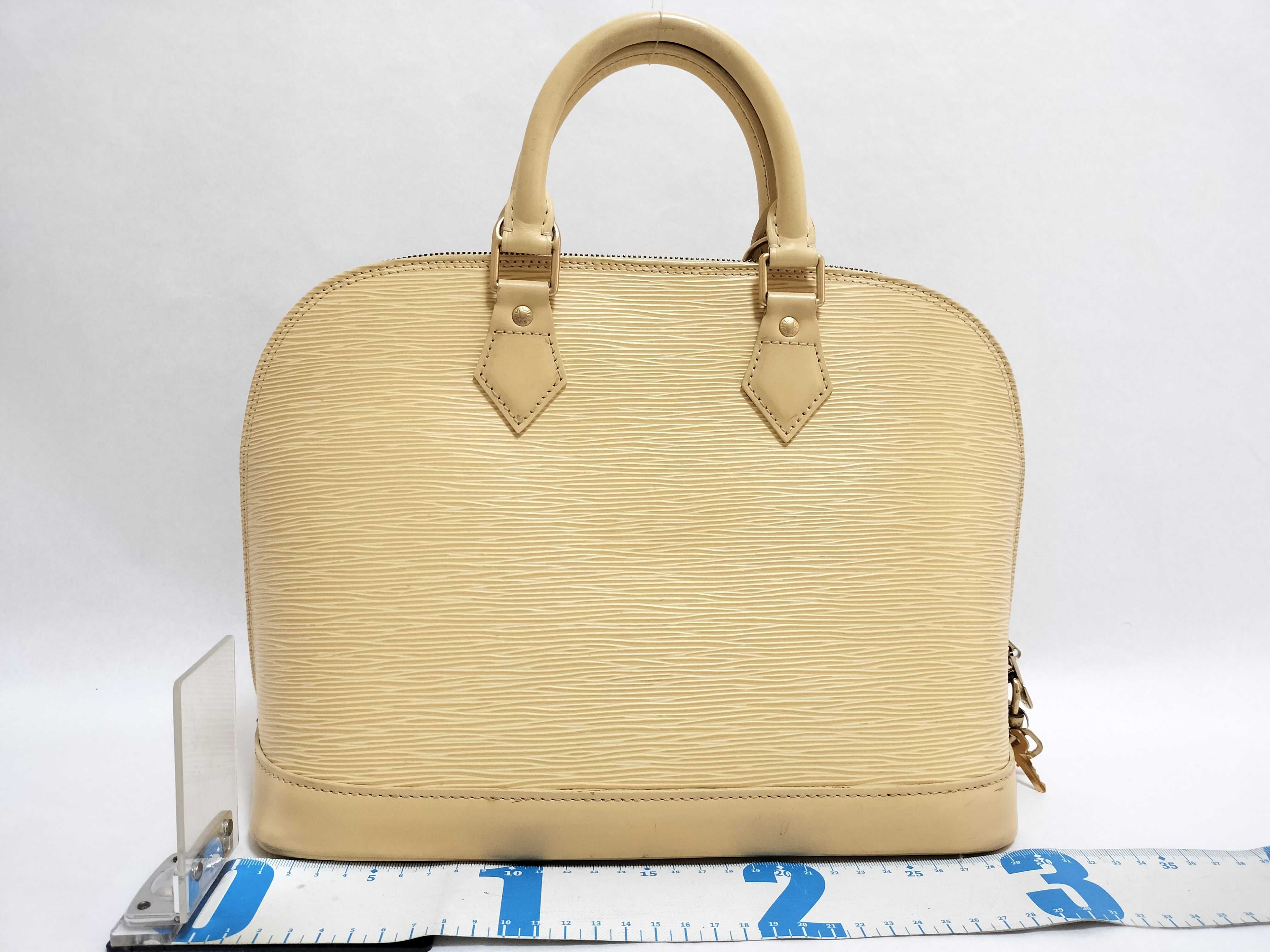Epi Louis Vuitton Alma Epi PM Handbag — view 2