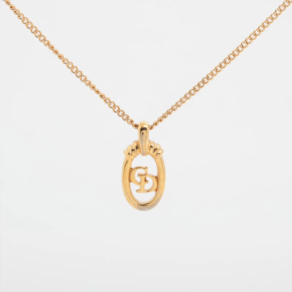 CD logo necklace, GP gold. Shows