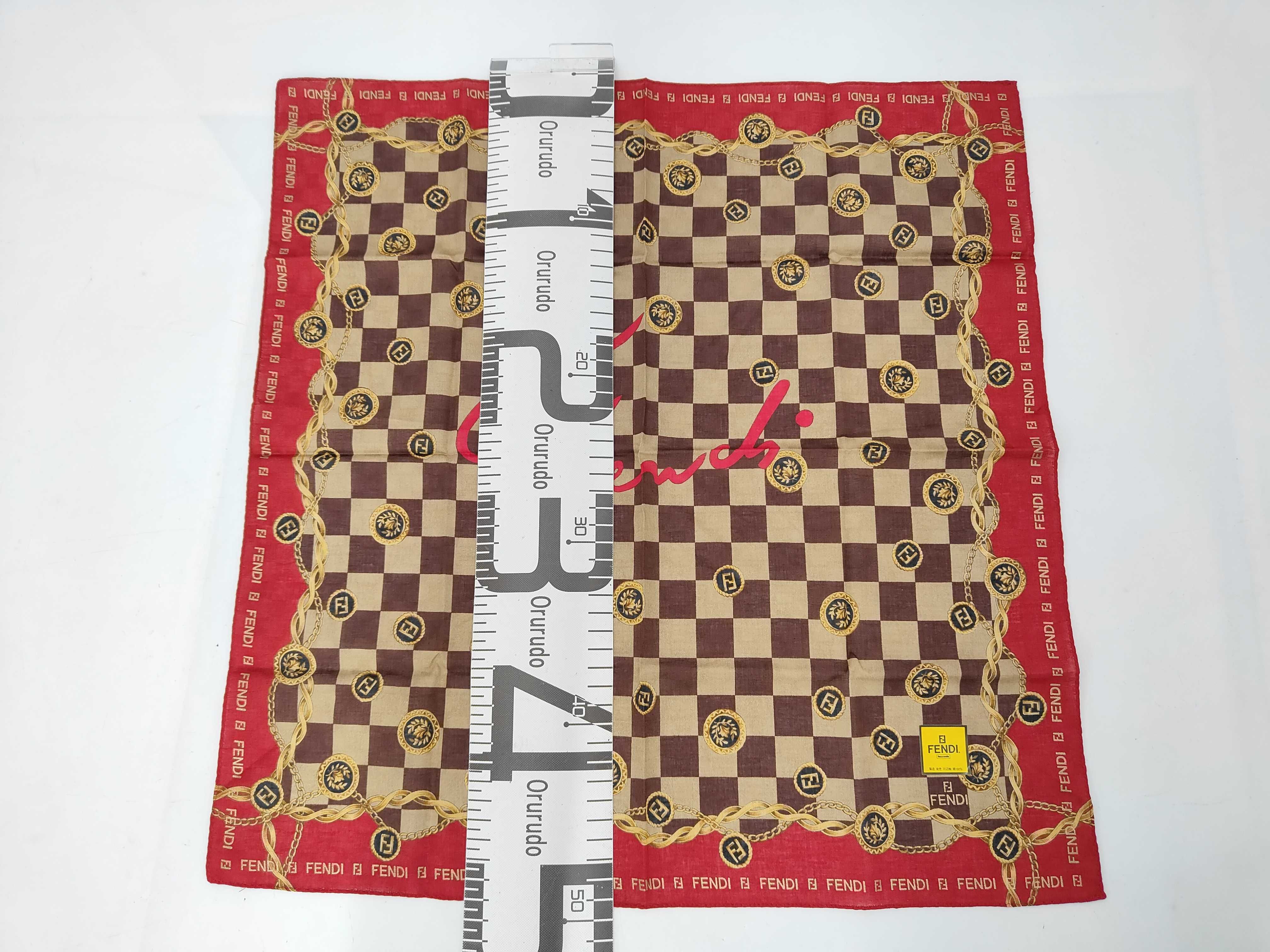 handkerchief scarf with sticker, central logo FF, Zucca pattern, chain, checkerboard pattern, and other accessories. — view 2