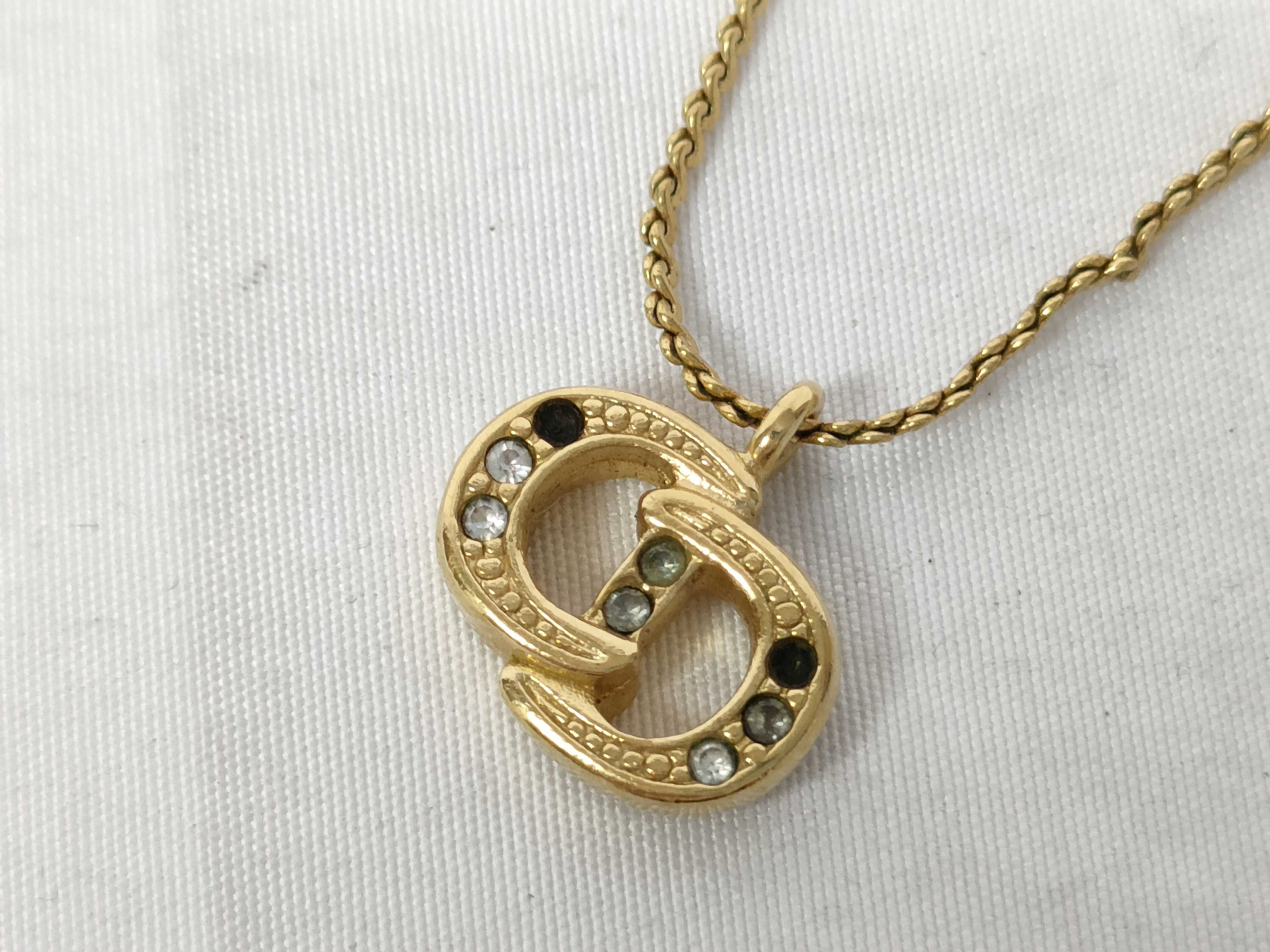 necklace with CD logo (scratched)
