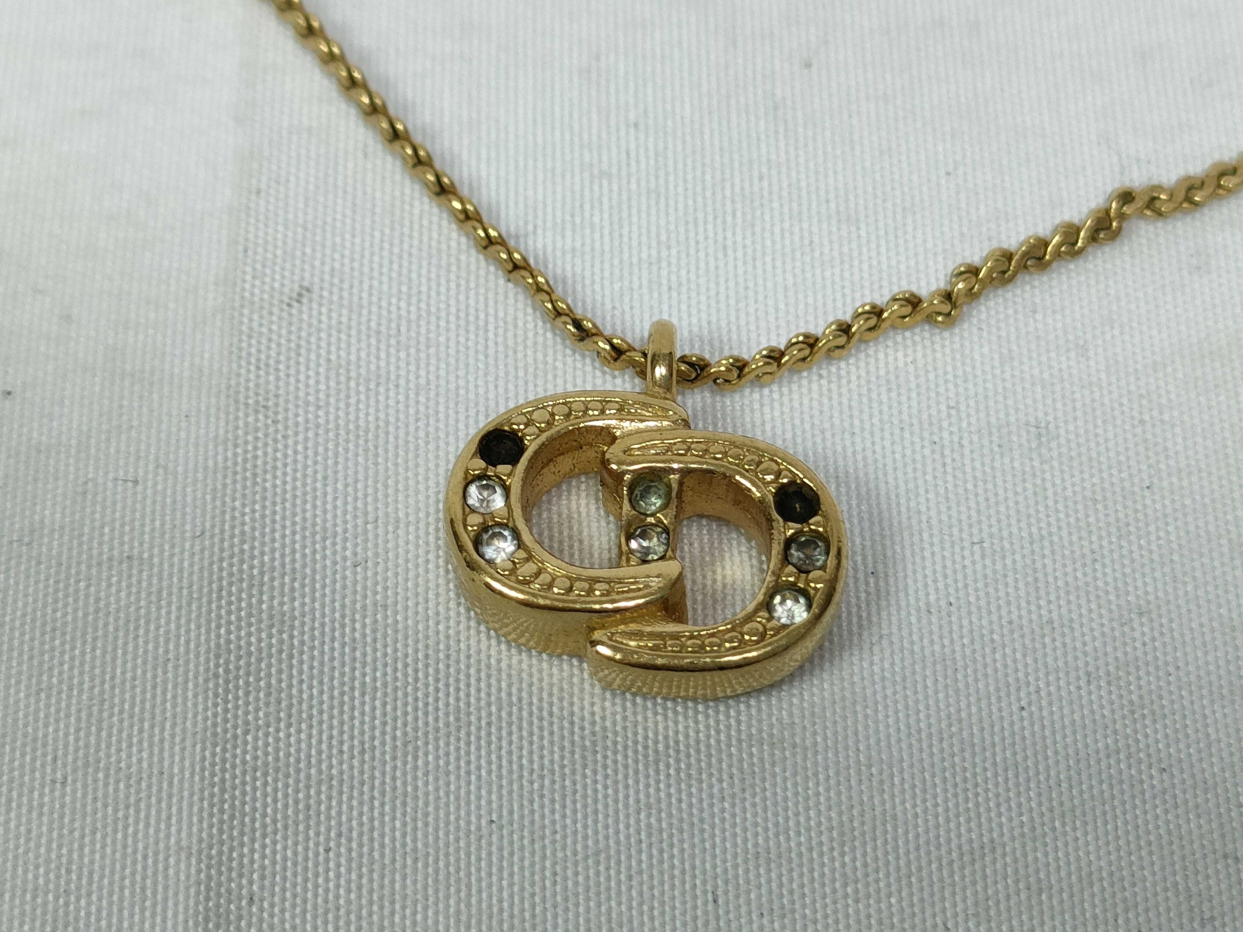 necklace with CD logo (scratched) — view 2