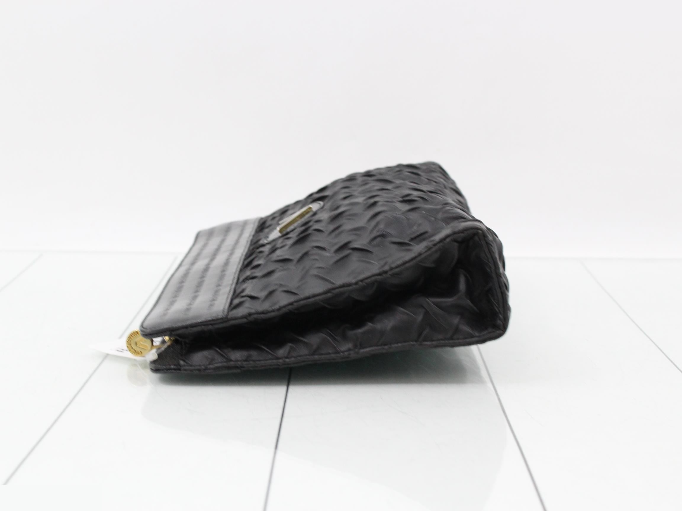 Leather clutch bag with paper tag. — view 4