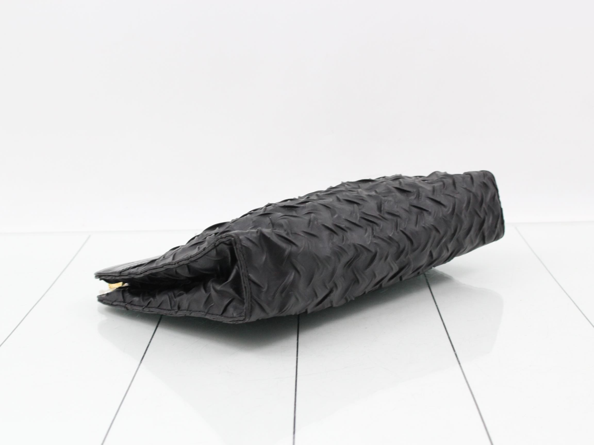 Leather clutch bag with paper tag. — view 5