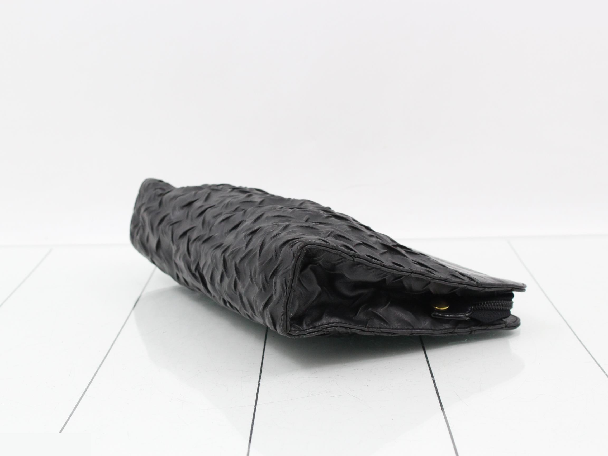 Leather clutch bag with paper tag. — view 6