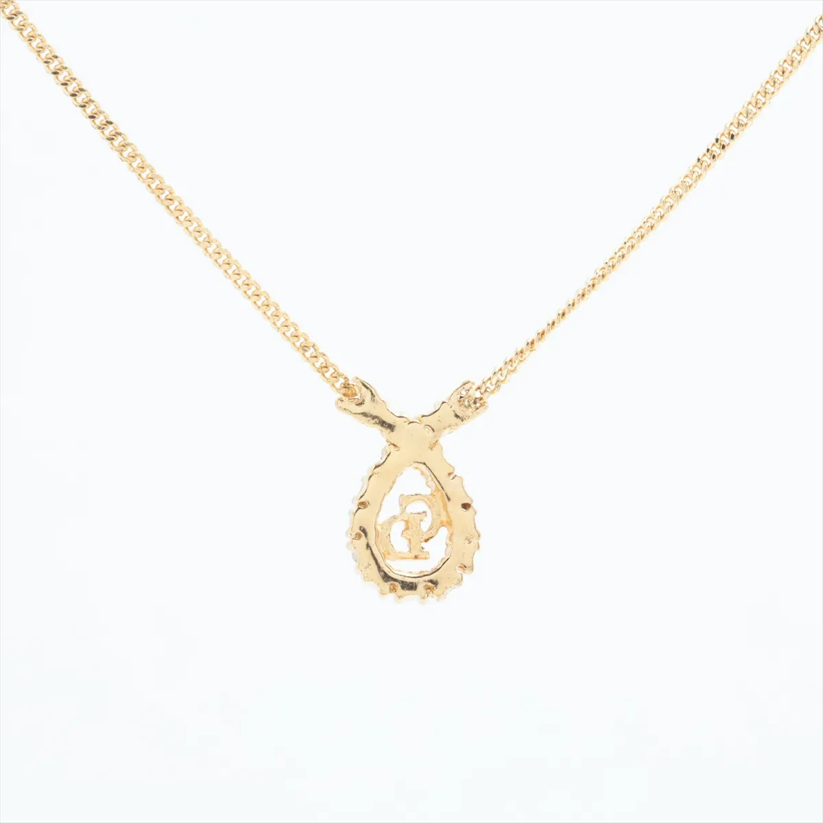 CD logo necklace, gold plated with rhinestones. Shows signs of wear, — view 2