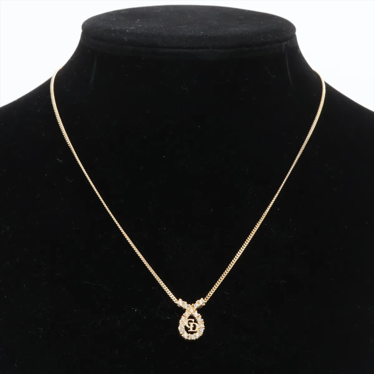 CD logo necklace, gold plated with rhinestones. Shows signs of wear, — view 5