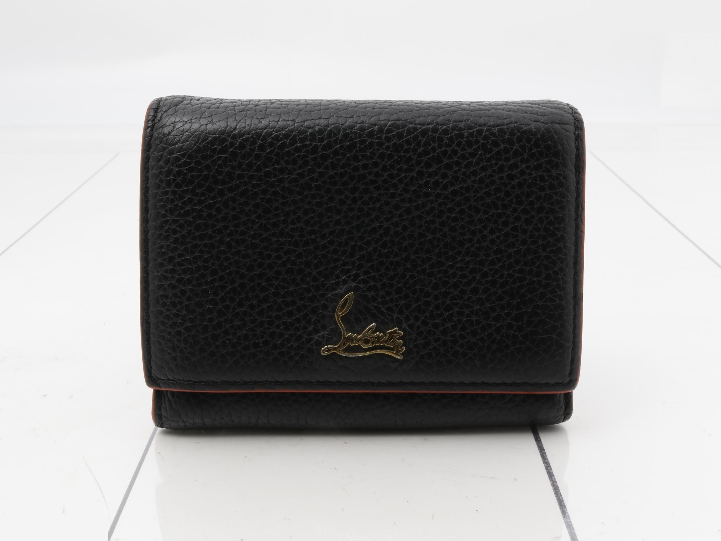 trifold wallet with logo hardware.