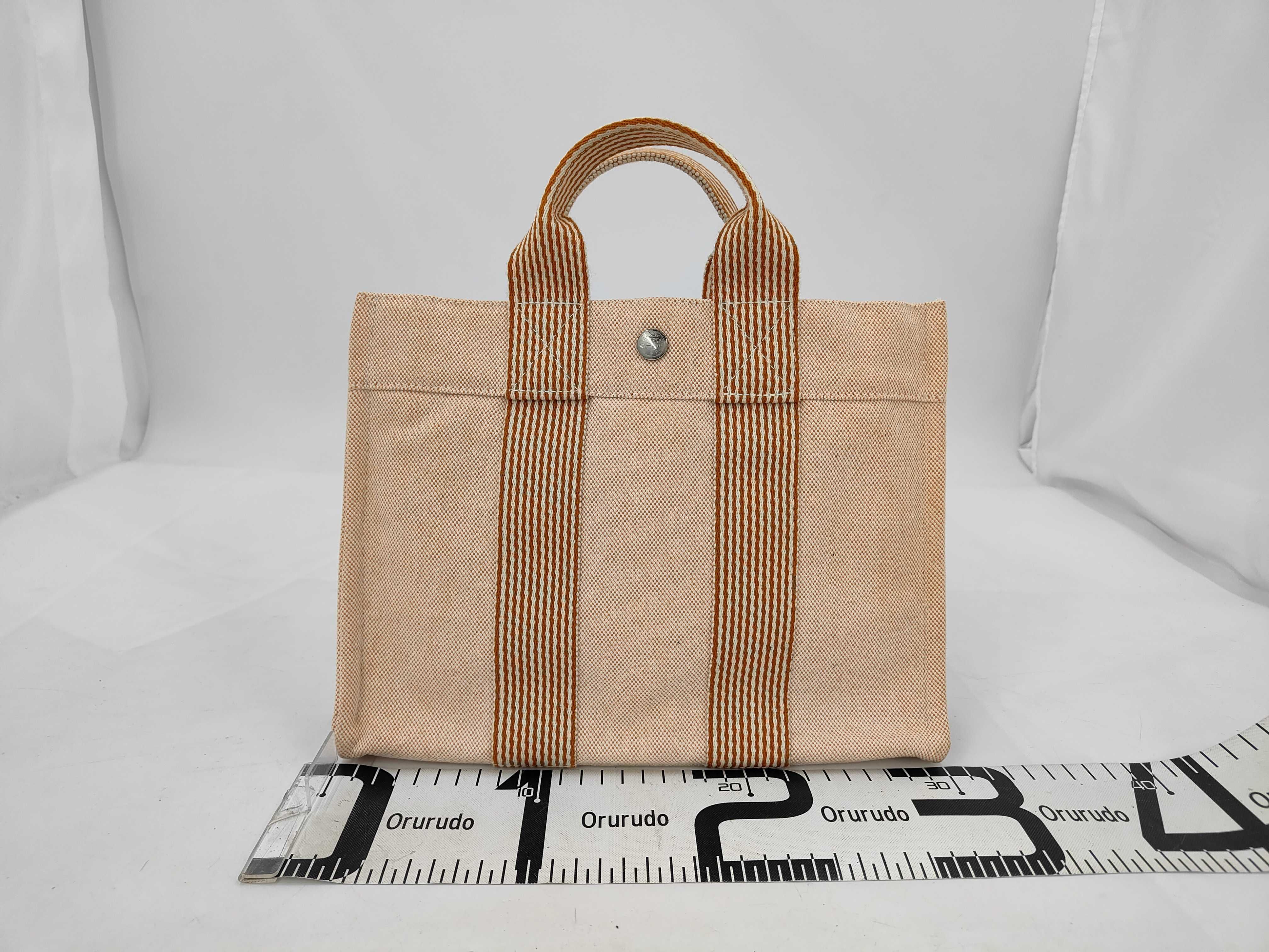 Her handbag — view 2