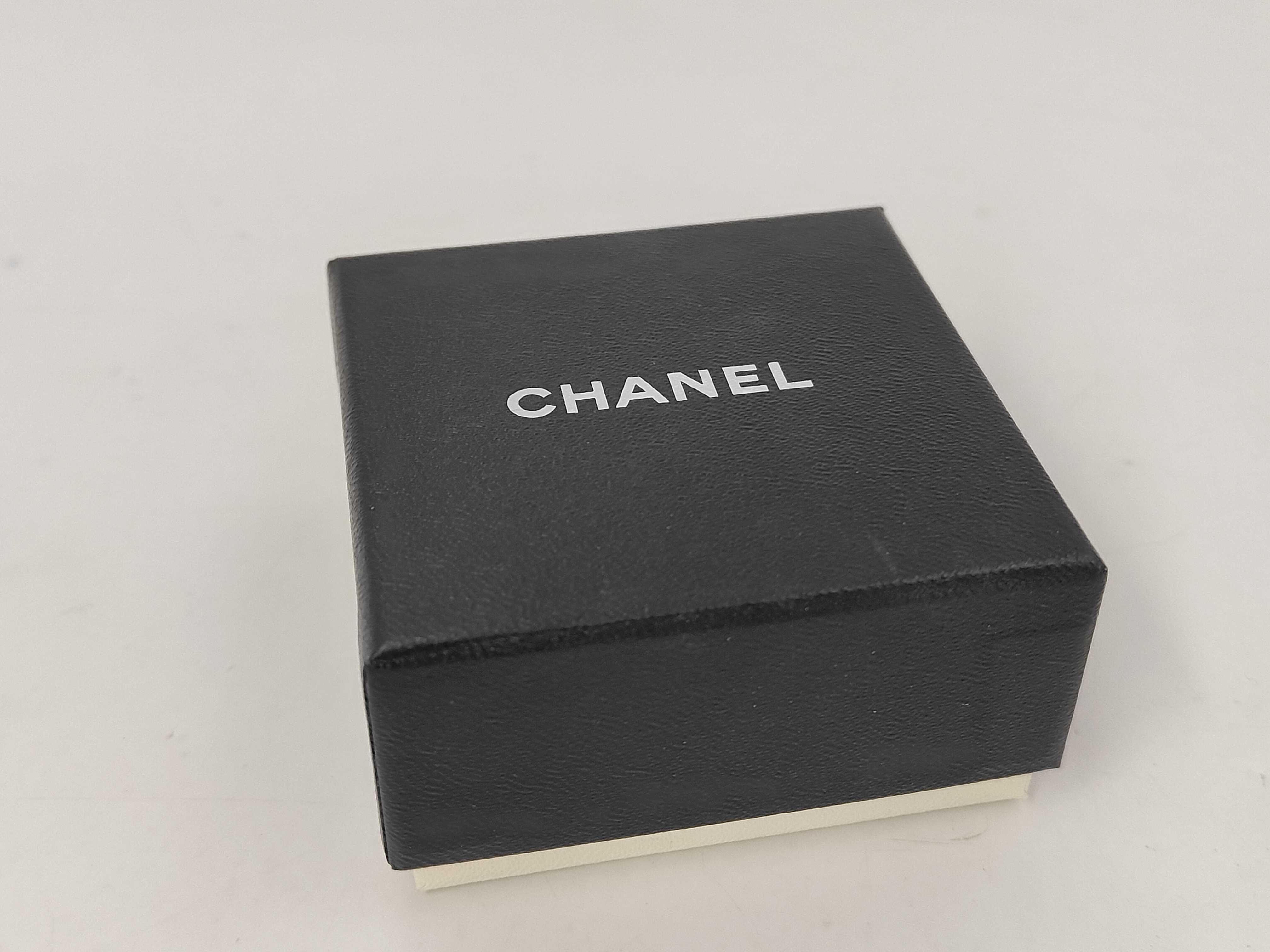 logo gold x black RG ring — view 7