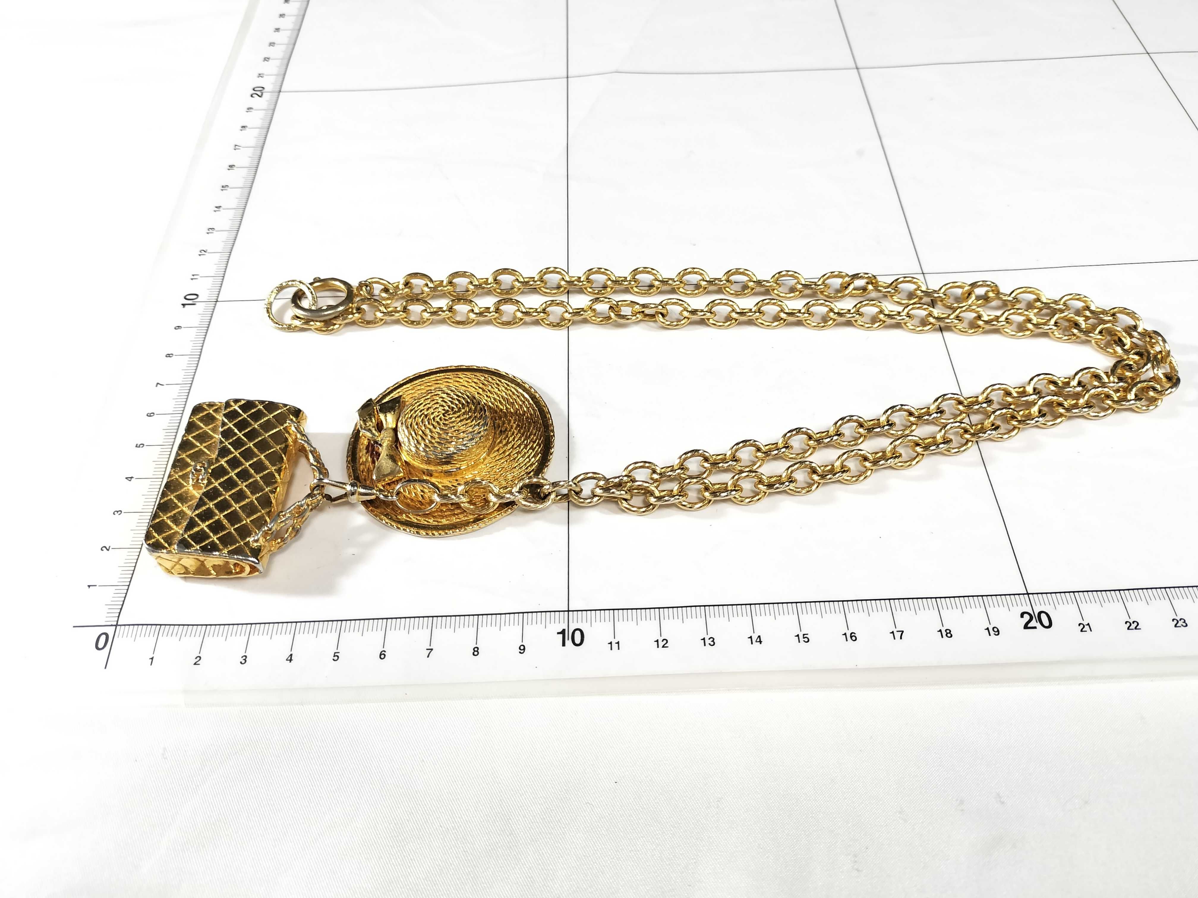 Matelassé bag, hat motif chain necklace, gold, and other accessories. — view 6
