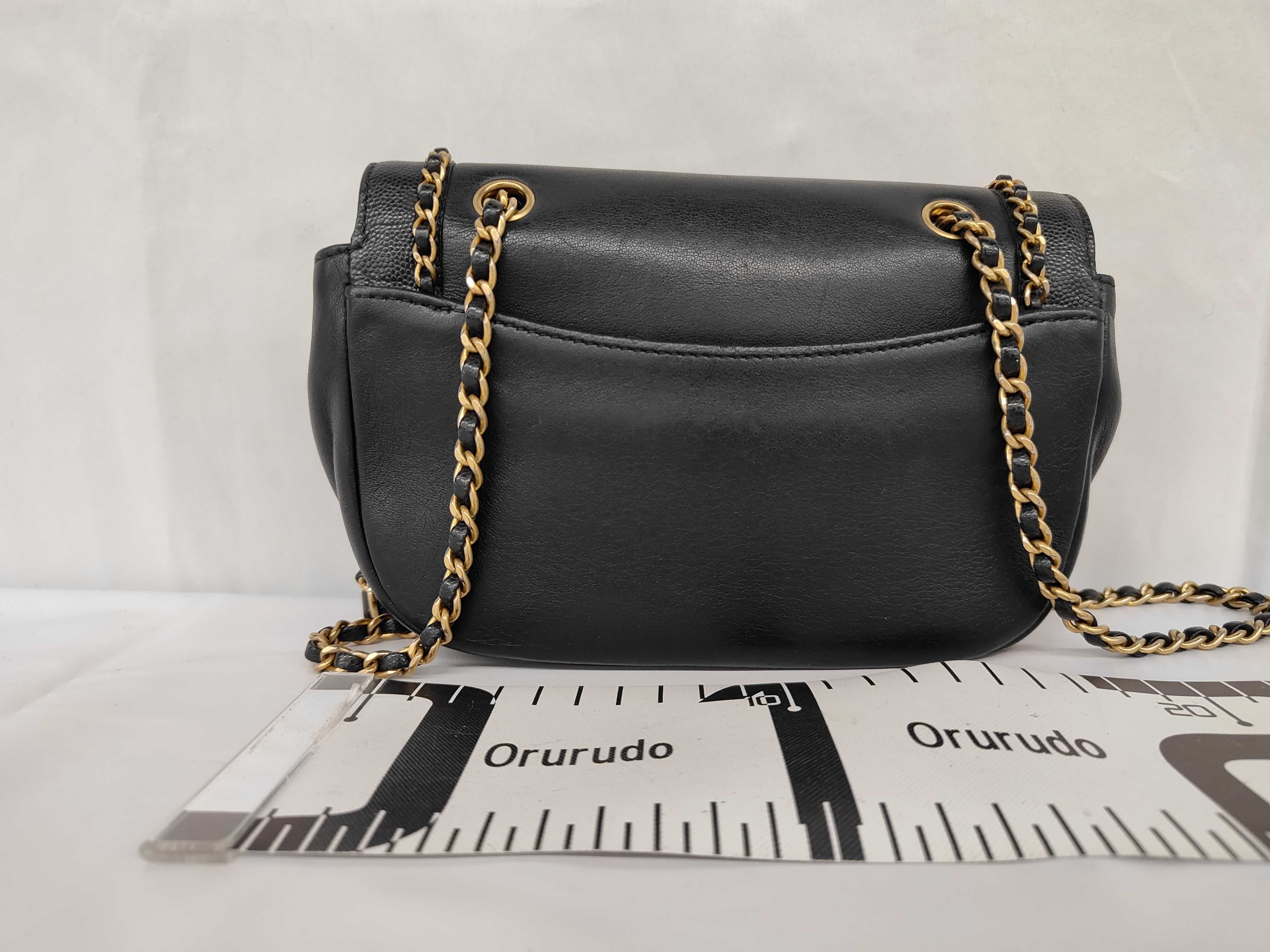 Chain Around Flap Shoulder Bag, Black Leather, Coin Charm, Gold Hardware. — view 2