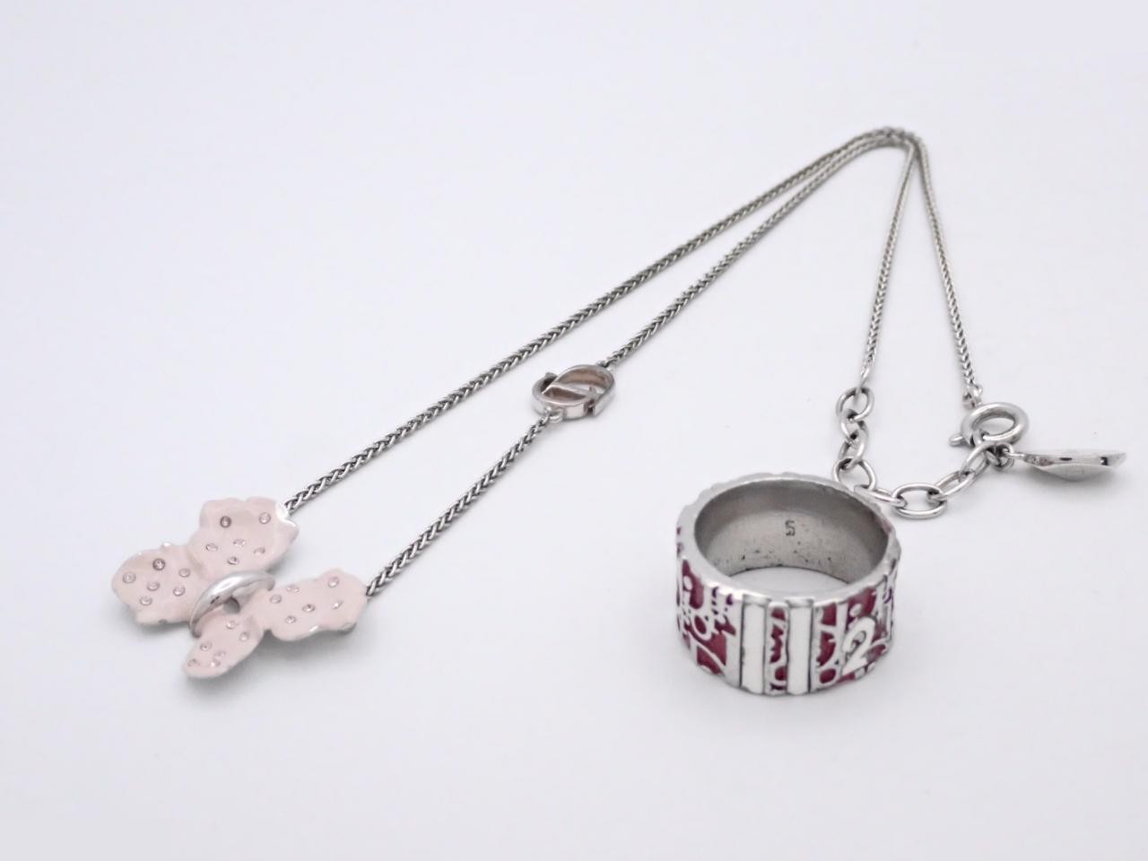 Summary: 1 ring, 1 necklace, 1 pair of earrings (3 items total) — view 2
