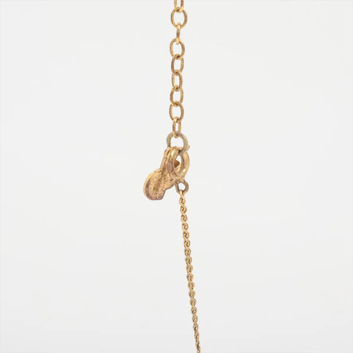 CD logo necklace, gold plated with rhinestones. Shows signs of wear, including dents, — view 3
