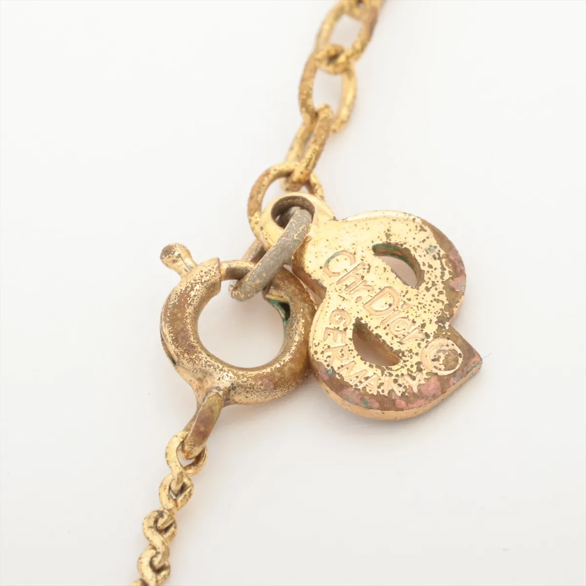 CD logo necklace, gold plated with rhinestones. Shows signs of wear, including dents, — view 4