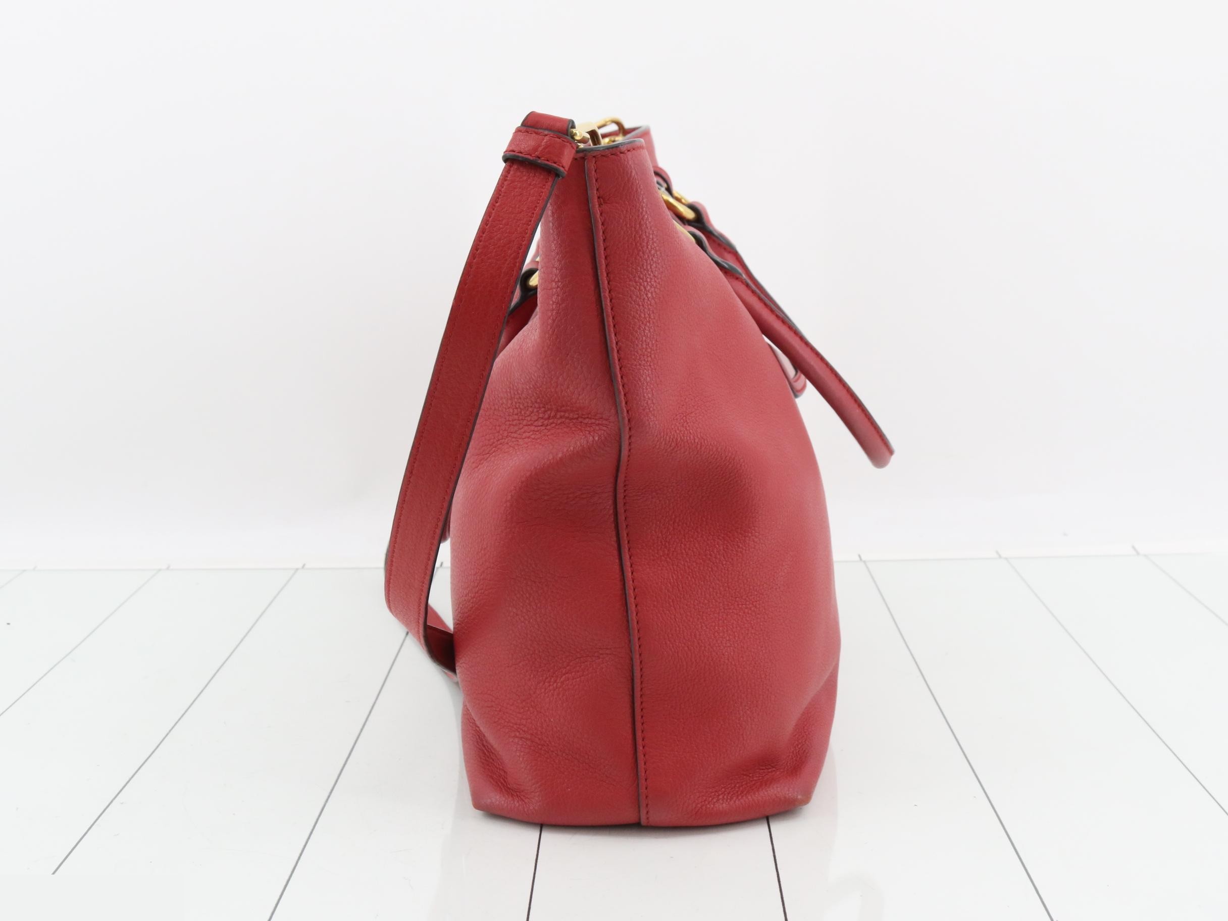 Leather tote bag, red, gold hardware, with shoulder strap and name tag. — view 4