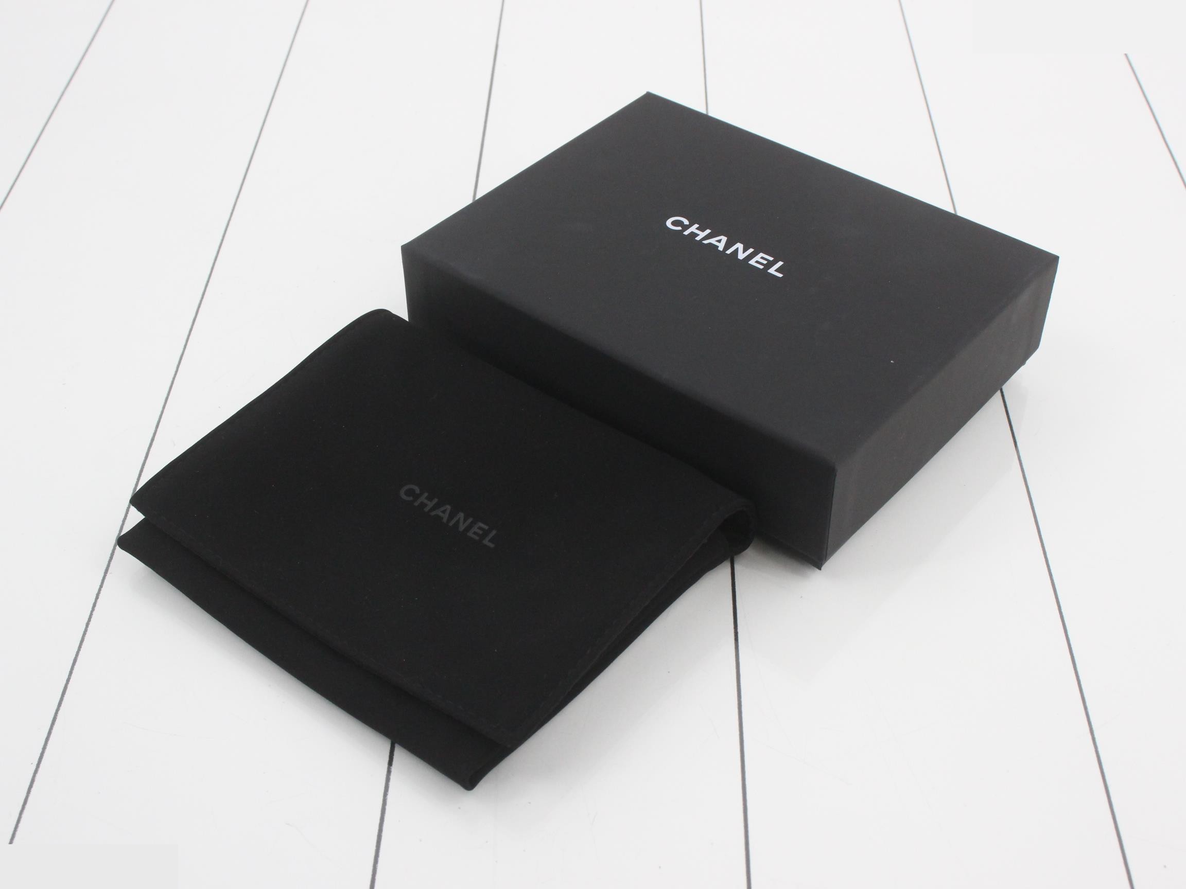 Caviar leather tri-fold wallet with Coco mark — view 5