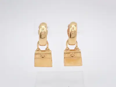 Other lines: Precious metals, earrings, bag motif, ear clips