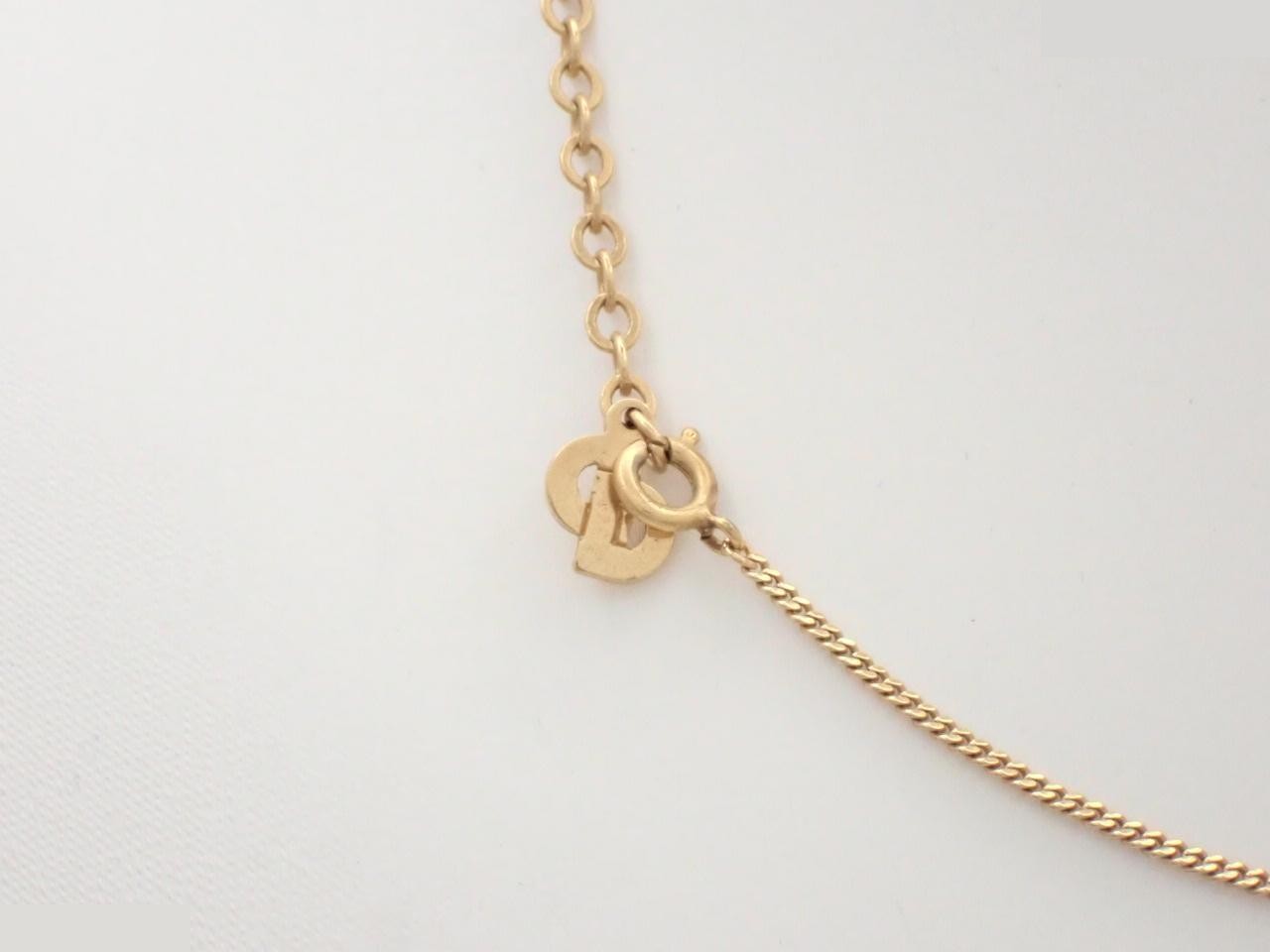 Gold necklace with stone, chain approximately 42cm long. — view 2