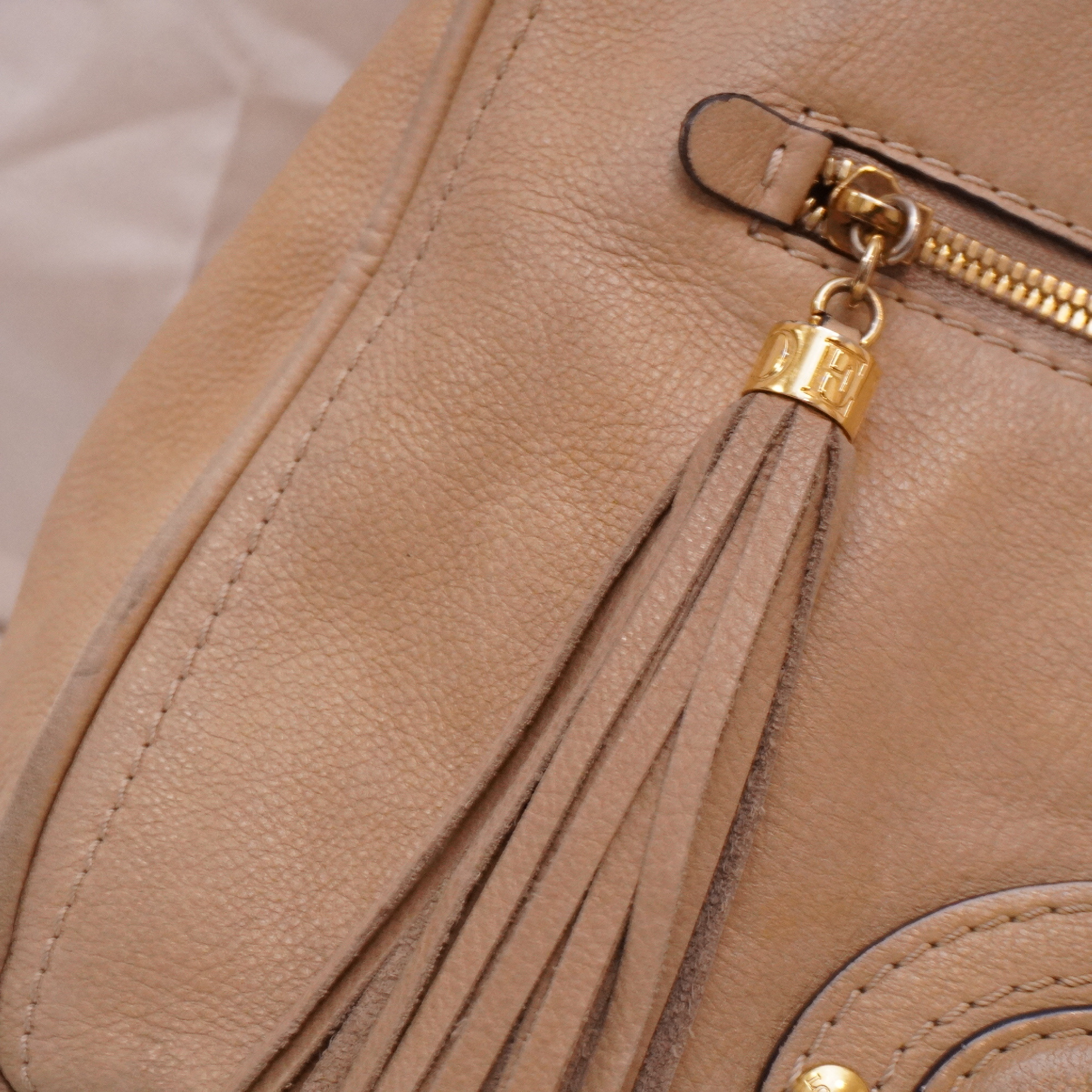 Anagram embossed fringe tassel design tan beige tote bag — view 3
