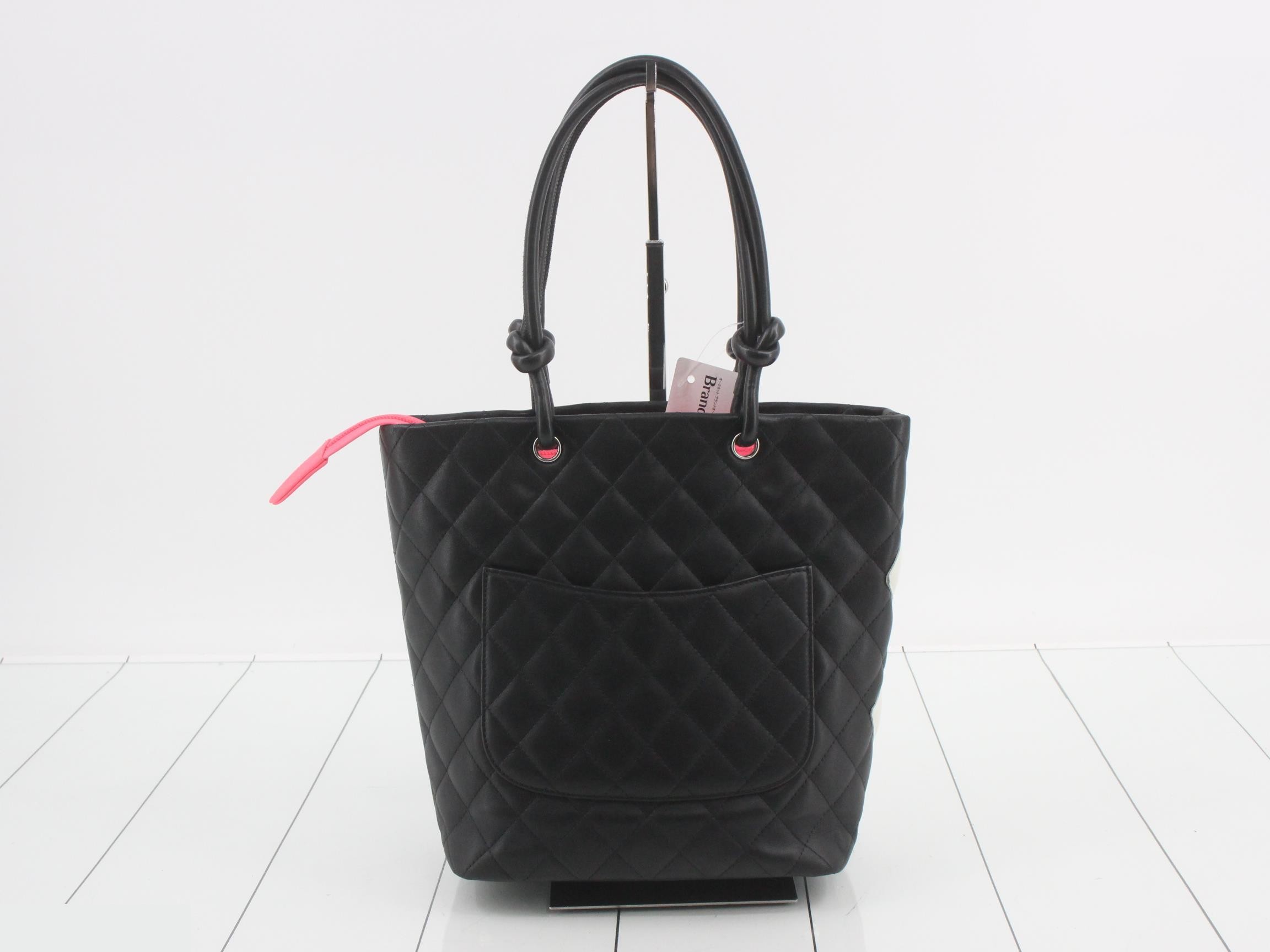 Medium tote bag, black, with sticker, item number 9. — view 2