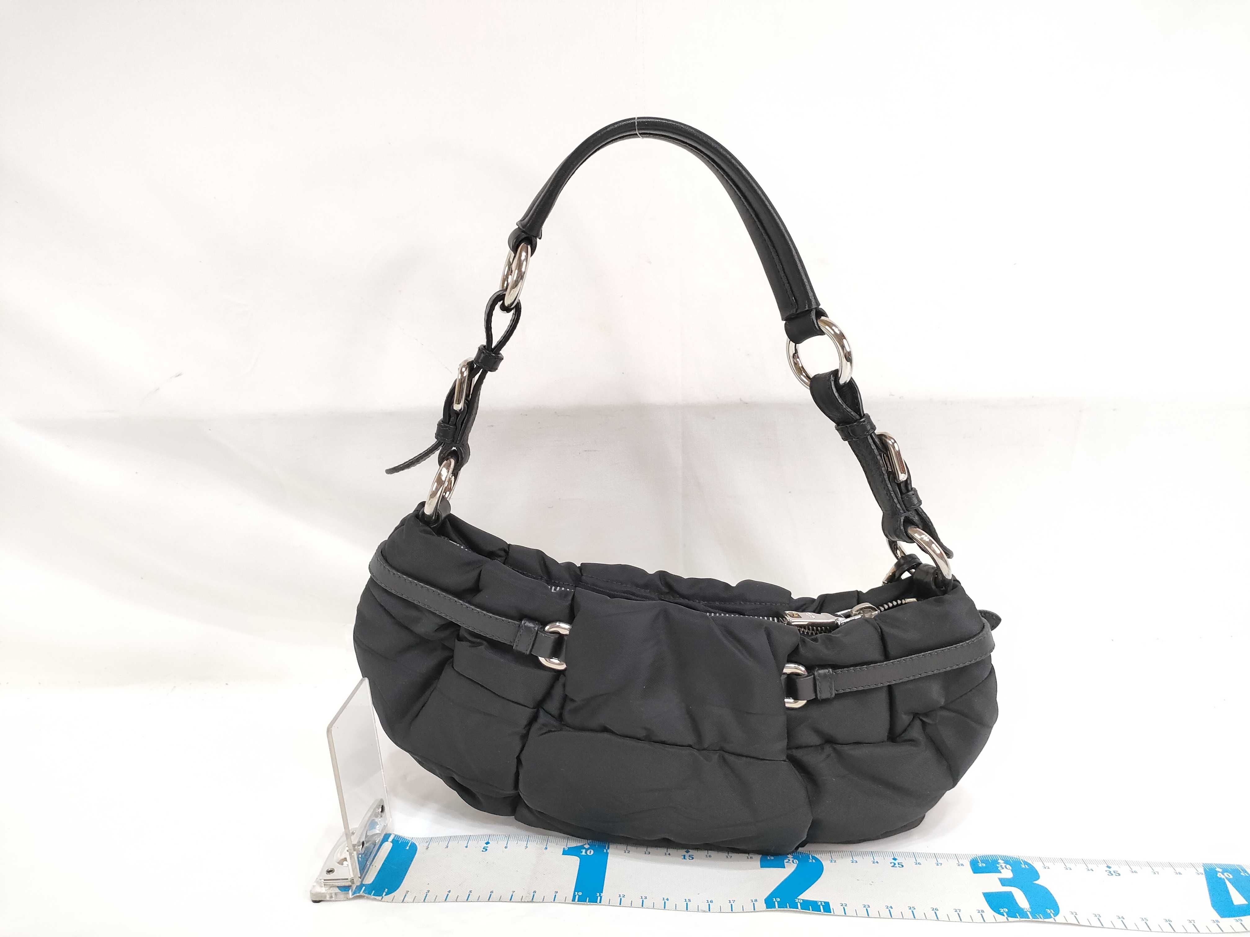 handbag with logo hardware, charm, dust bag, and shop card included. — view 2